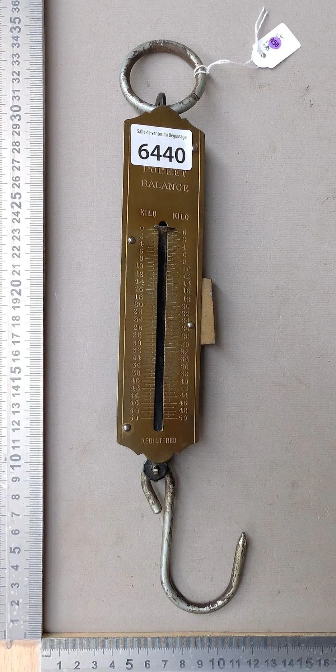Vintage scale with a sliding needle that moves up and down—see photos