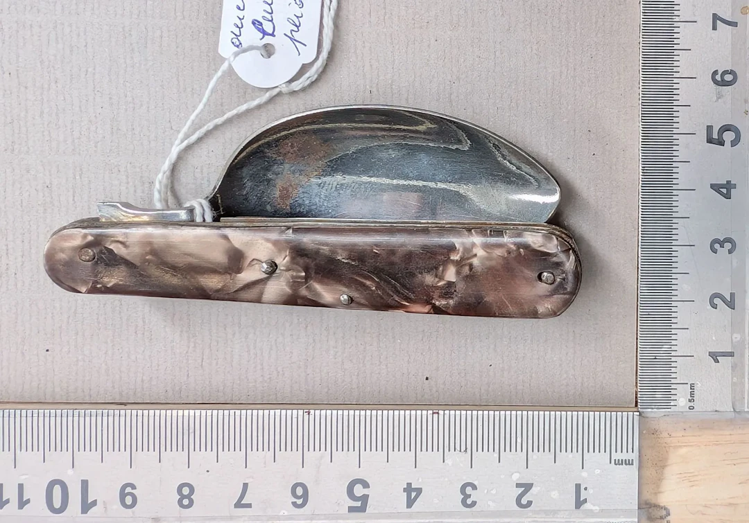 Antique folding spoon—see photos for dimensions and condition