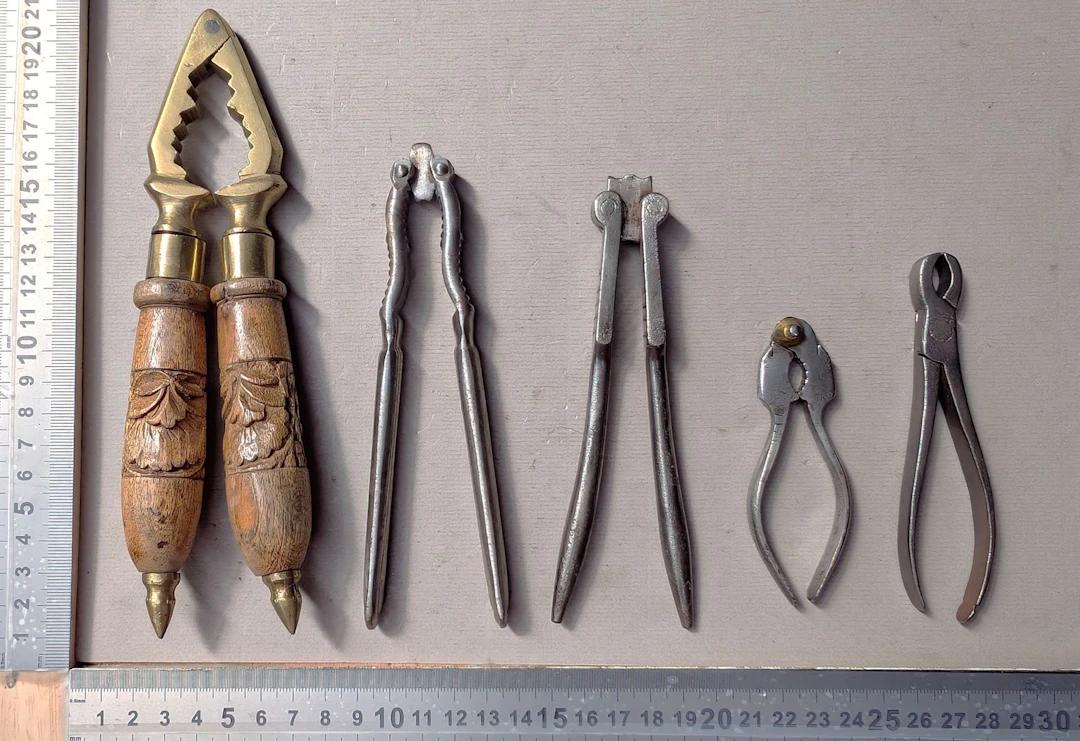 5 antique nutcrackers—see photos for dimensions and condition