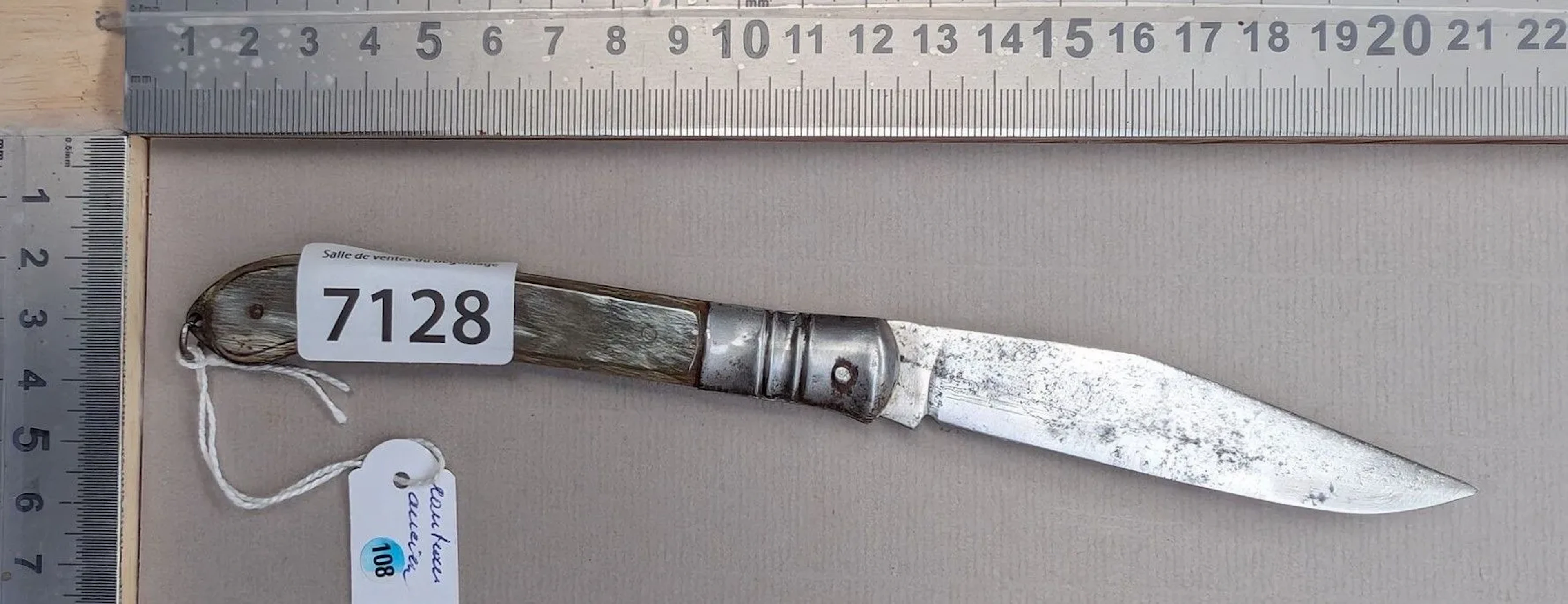 Antique knife with a horn handle—see photos for dimensions and condition