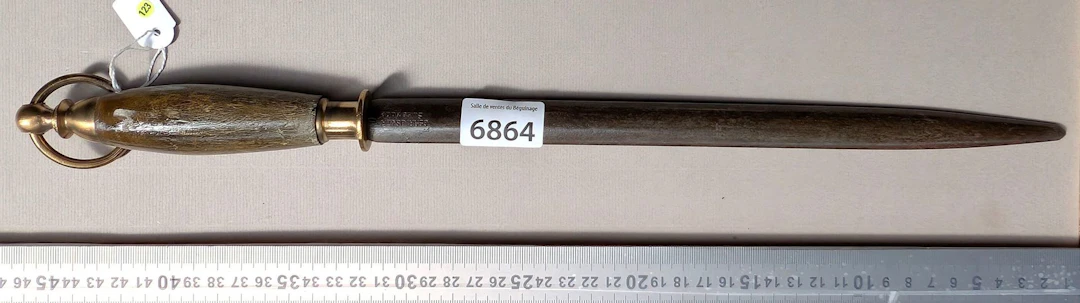 Antique butcher's sharpening knife with wooden handle, 20th century—see