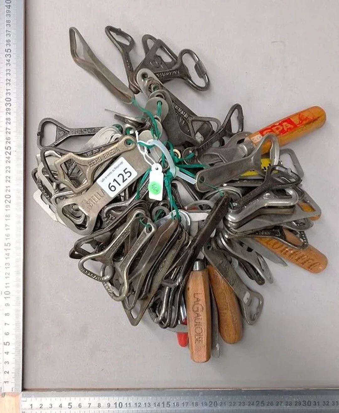 120 bottle openers—see photos for dimensions and condition