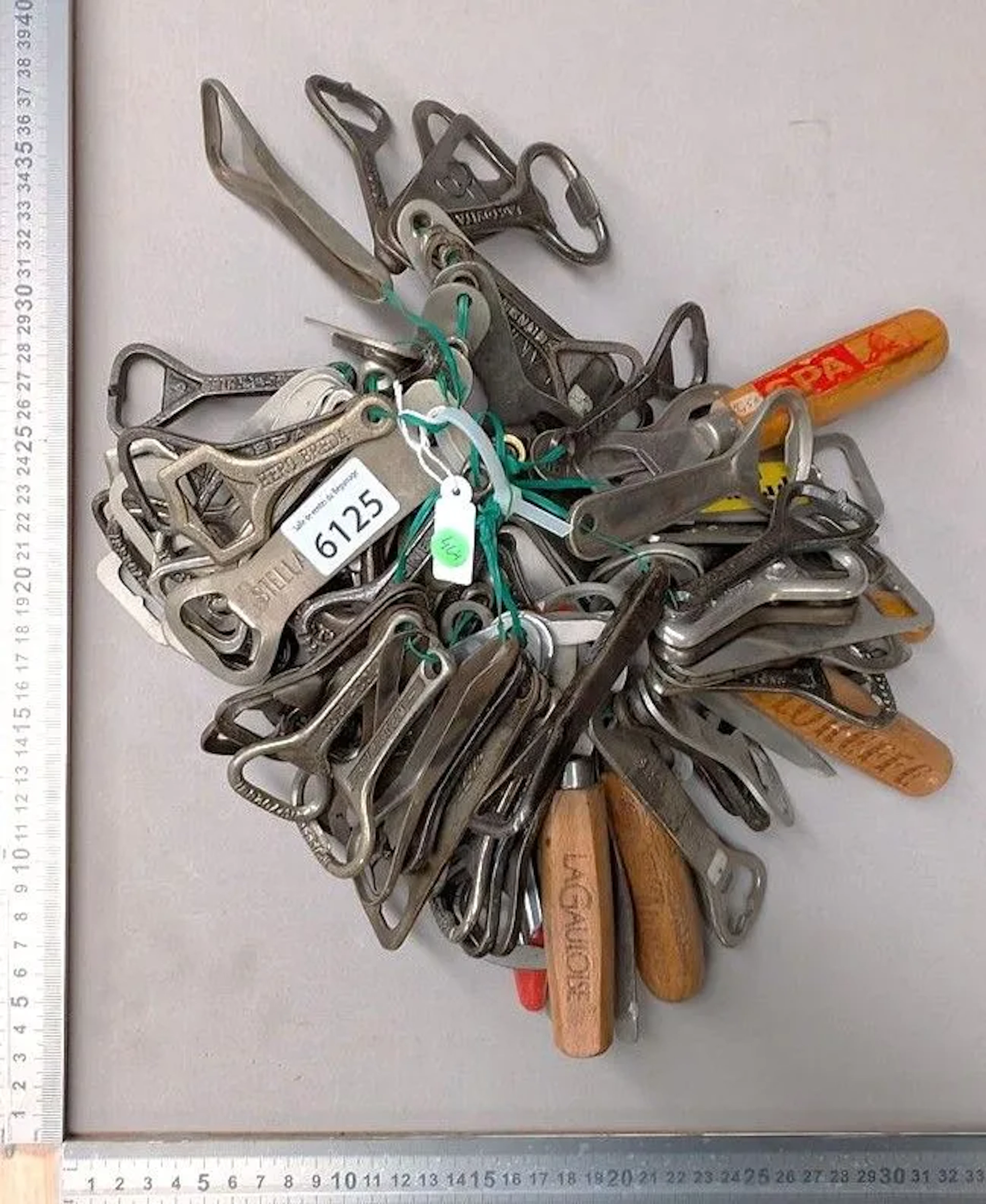 120 bottle openers—see photos for dimensions and condition