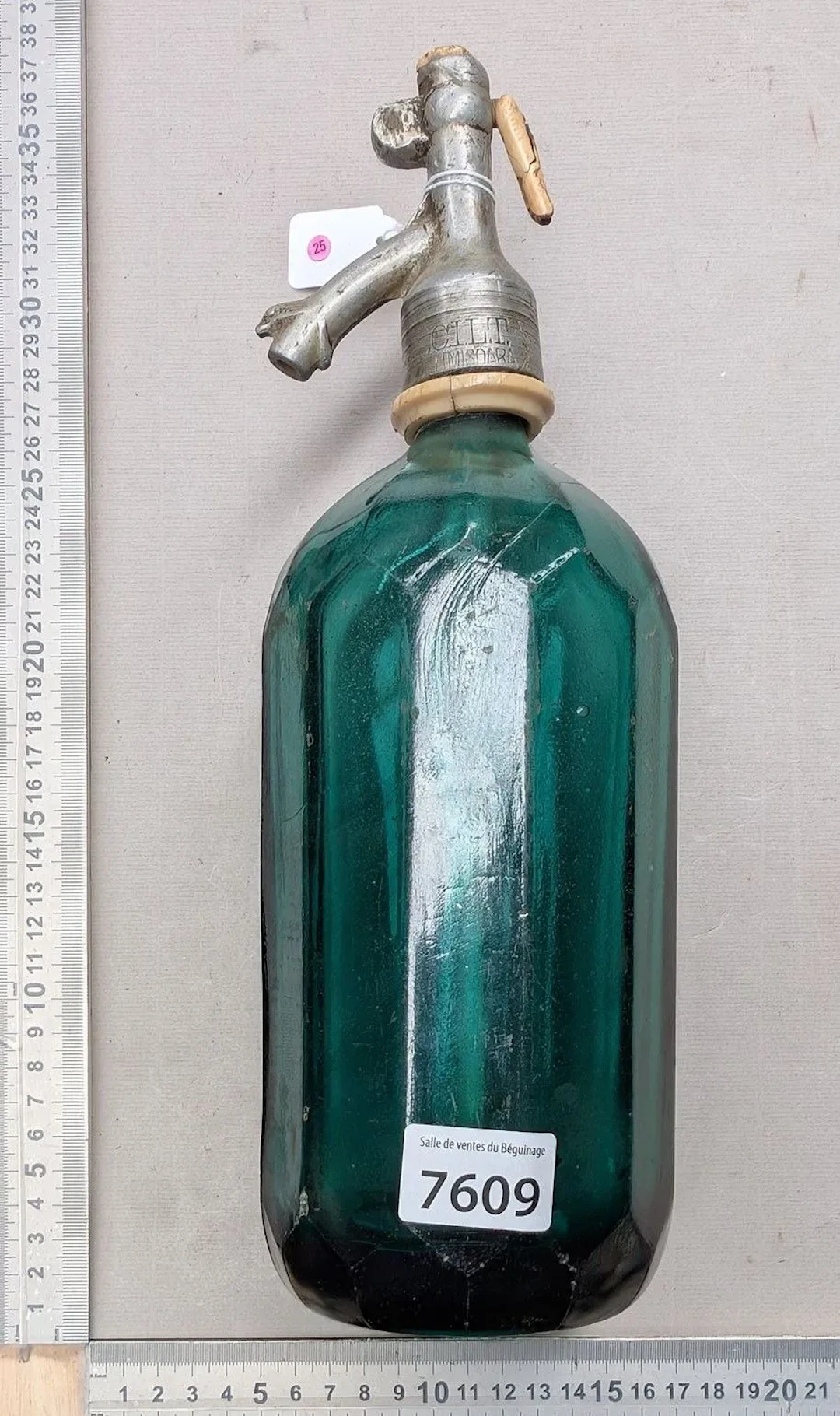 A lightweight siphon bottle with tin trim—see photos for dimensions