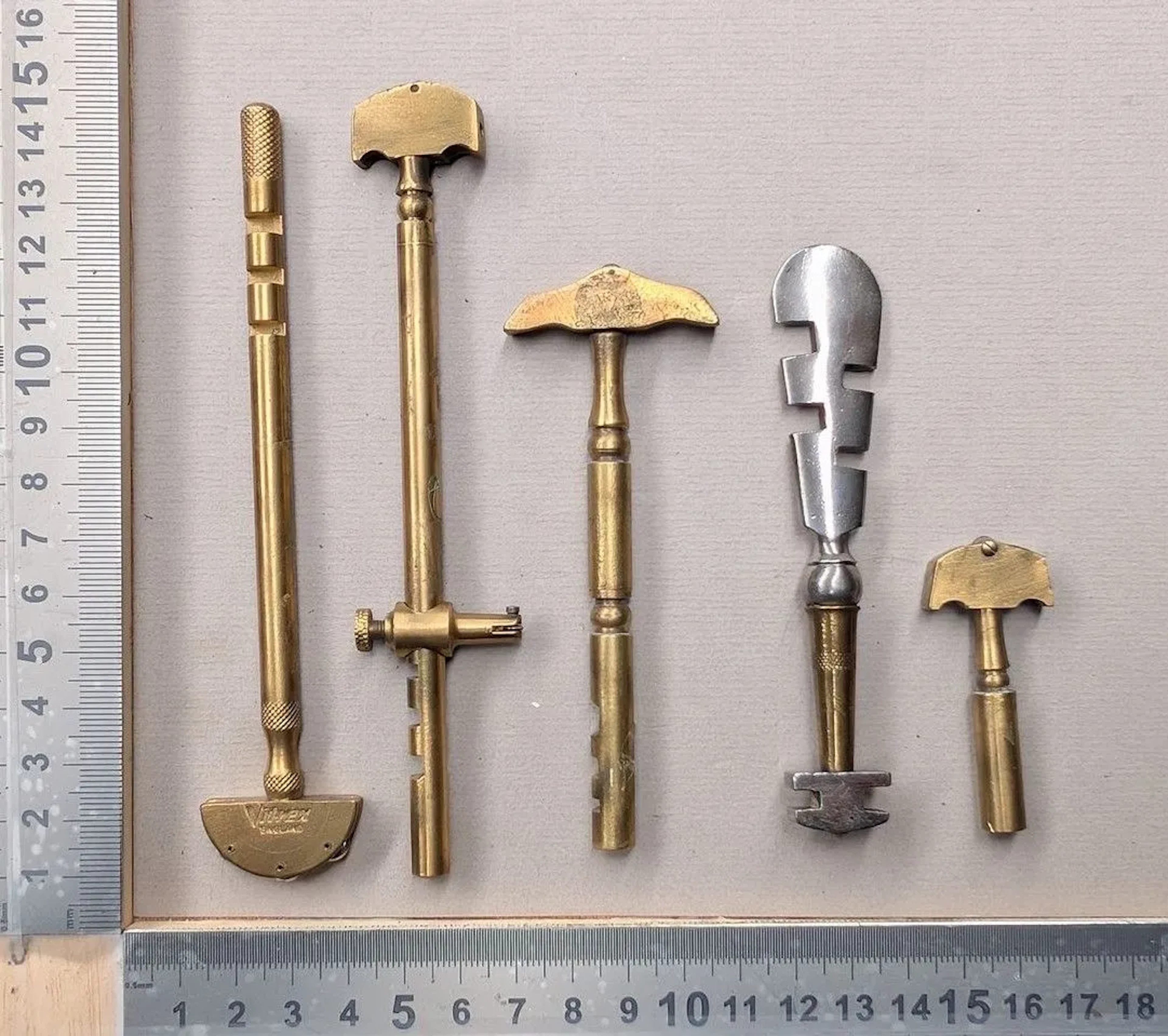 5 brass glass tumblers—see photos for dimensions and condition