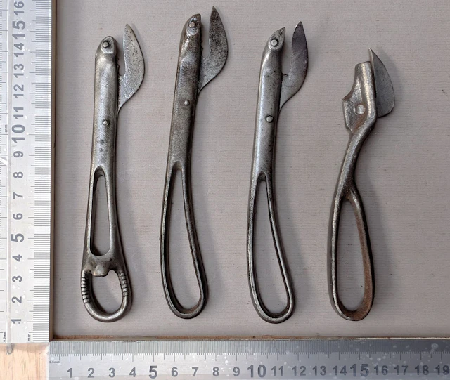 4 antique can openers—see photos for dimensions and condition