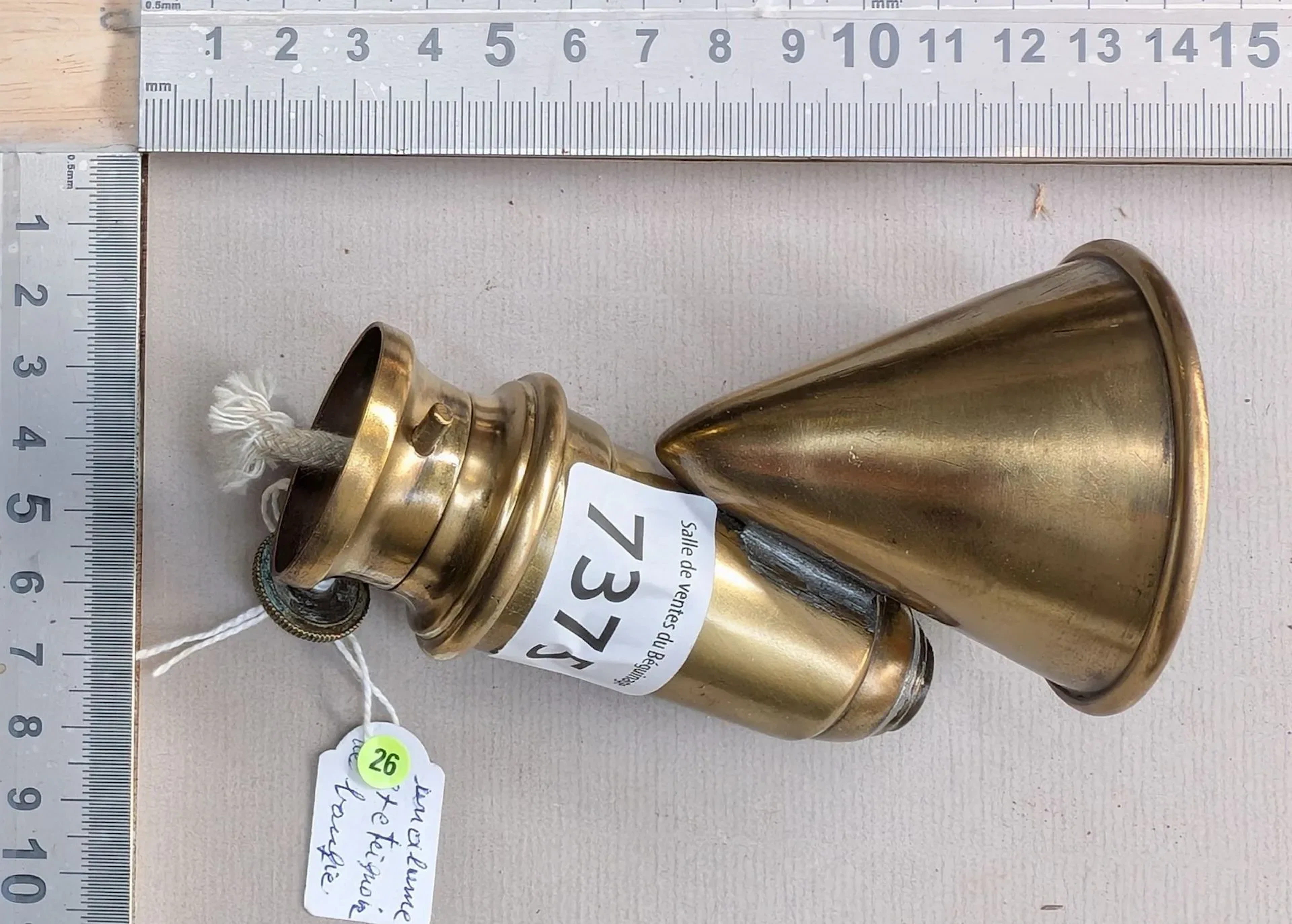 A candle lighter and snuffer—see photos for dimensions and condition