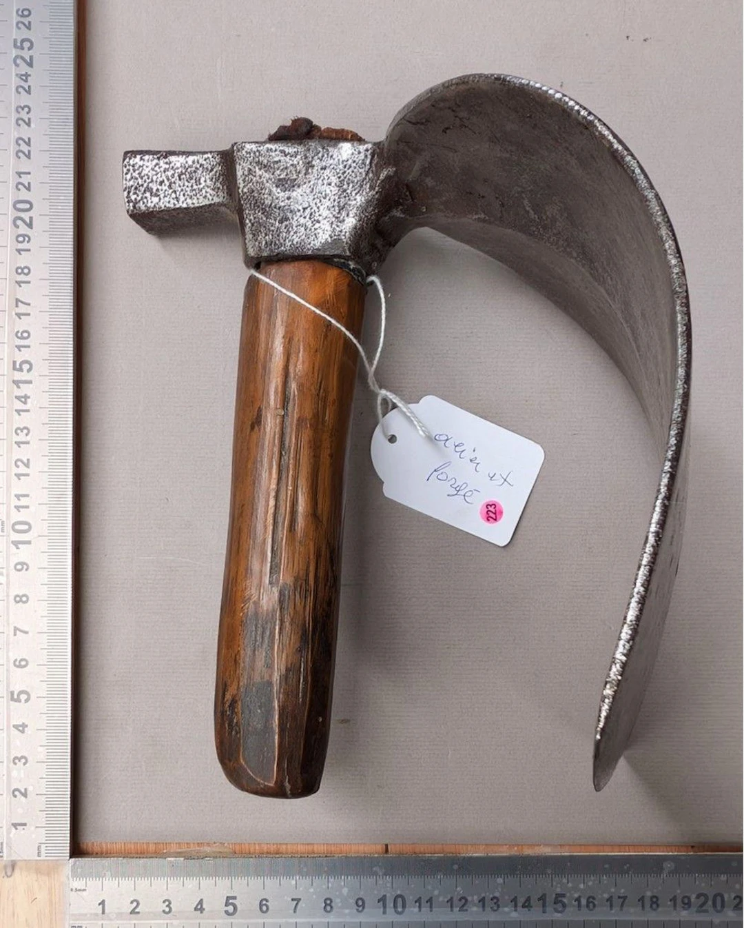 A forged steel adze—see photos for dimensions and condition