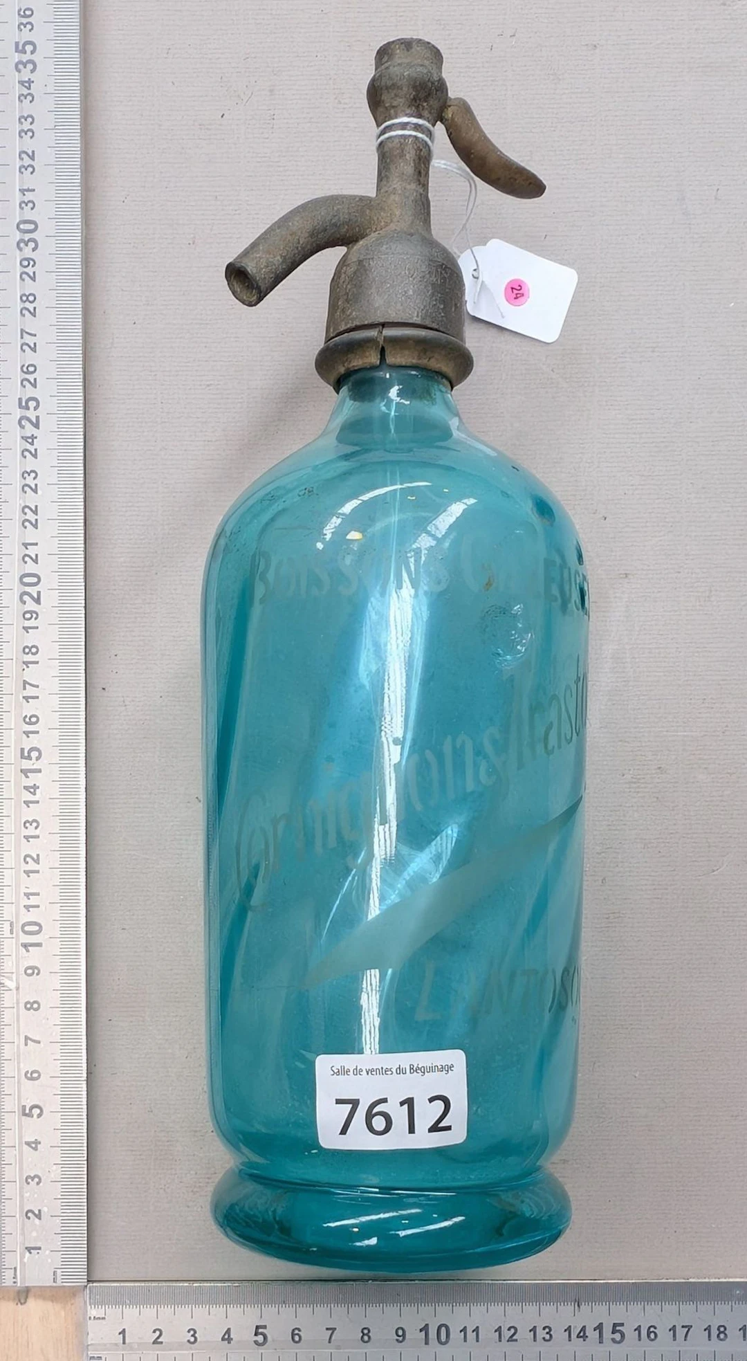 A lightweight siphon bottle with tin trim—see photos for dimensions
