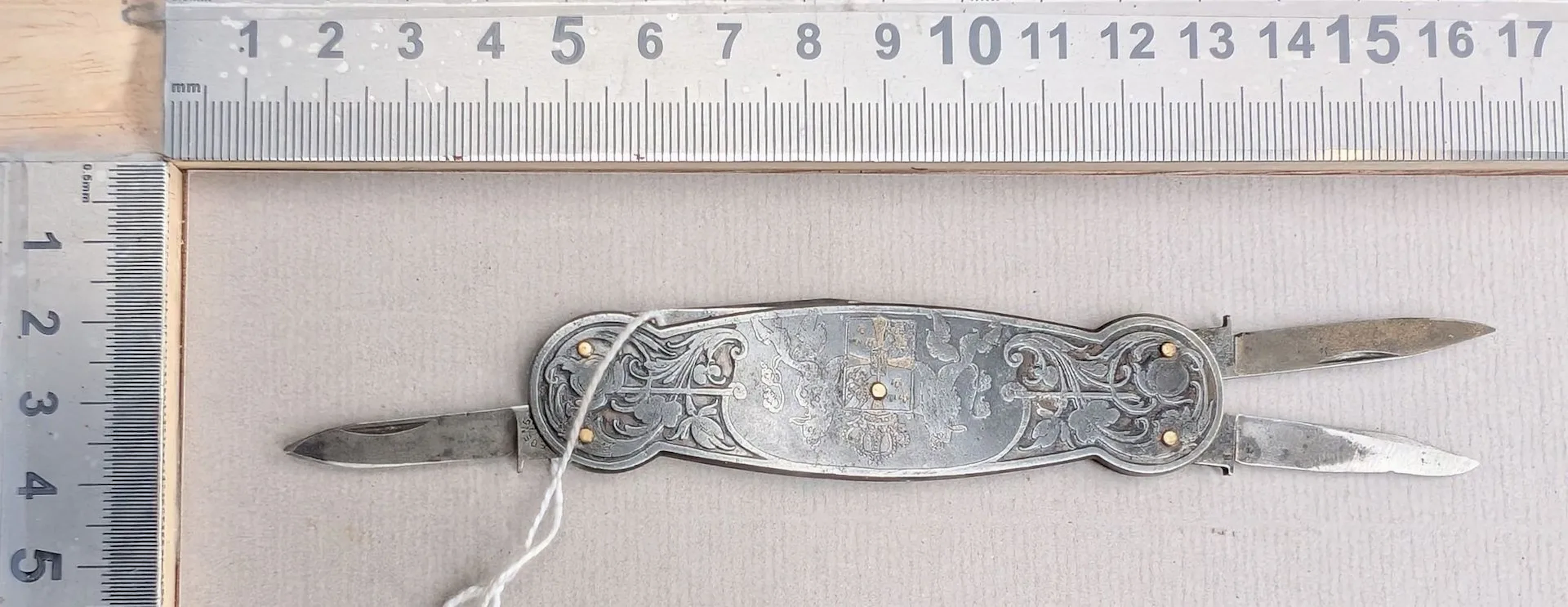 Vintage metal multi-purpose pocket knife—see photos for dimensions