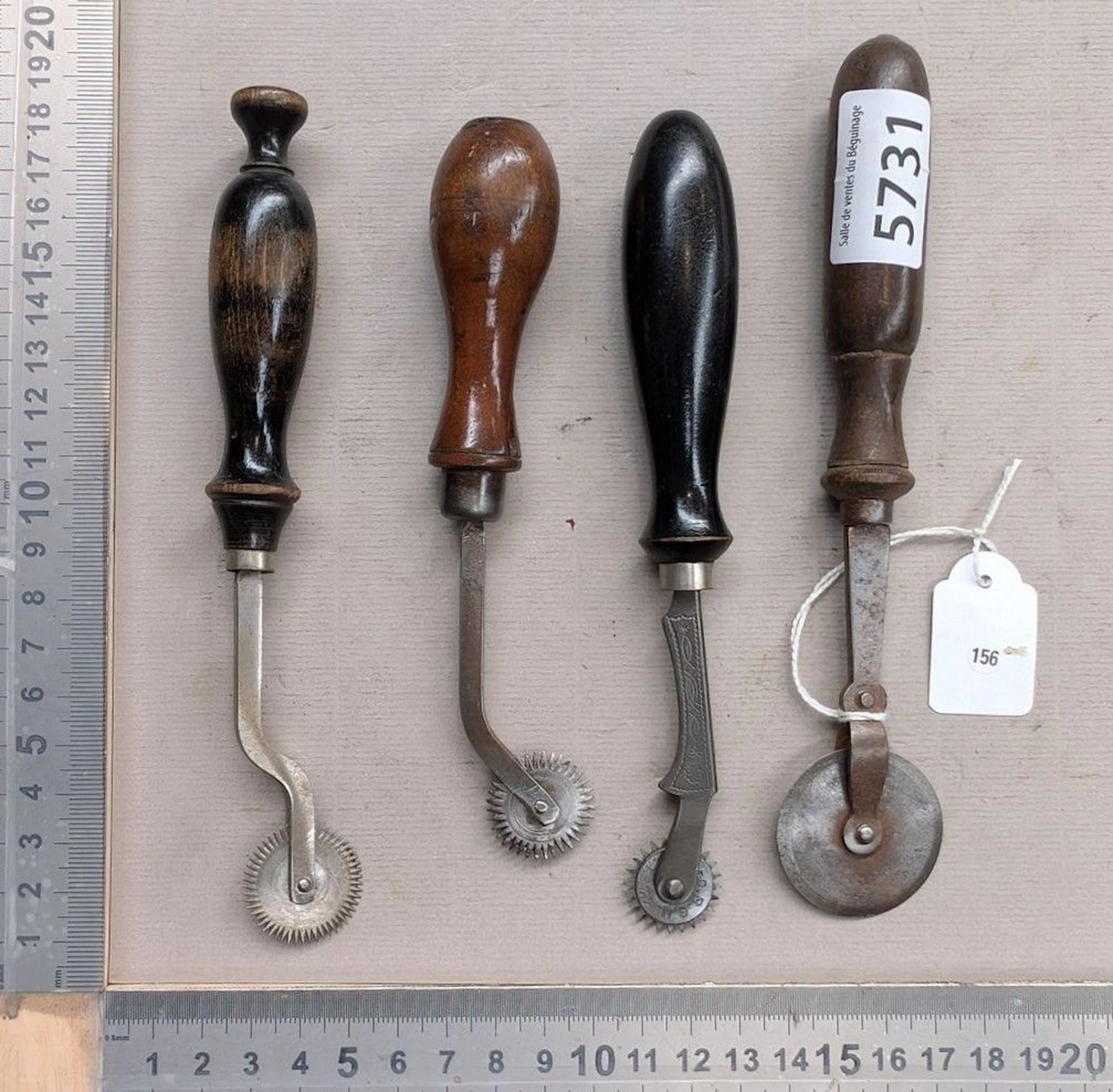 4 forged steel casters with wooden handles—see photos for dimensions