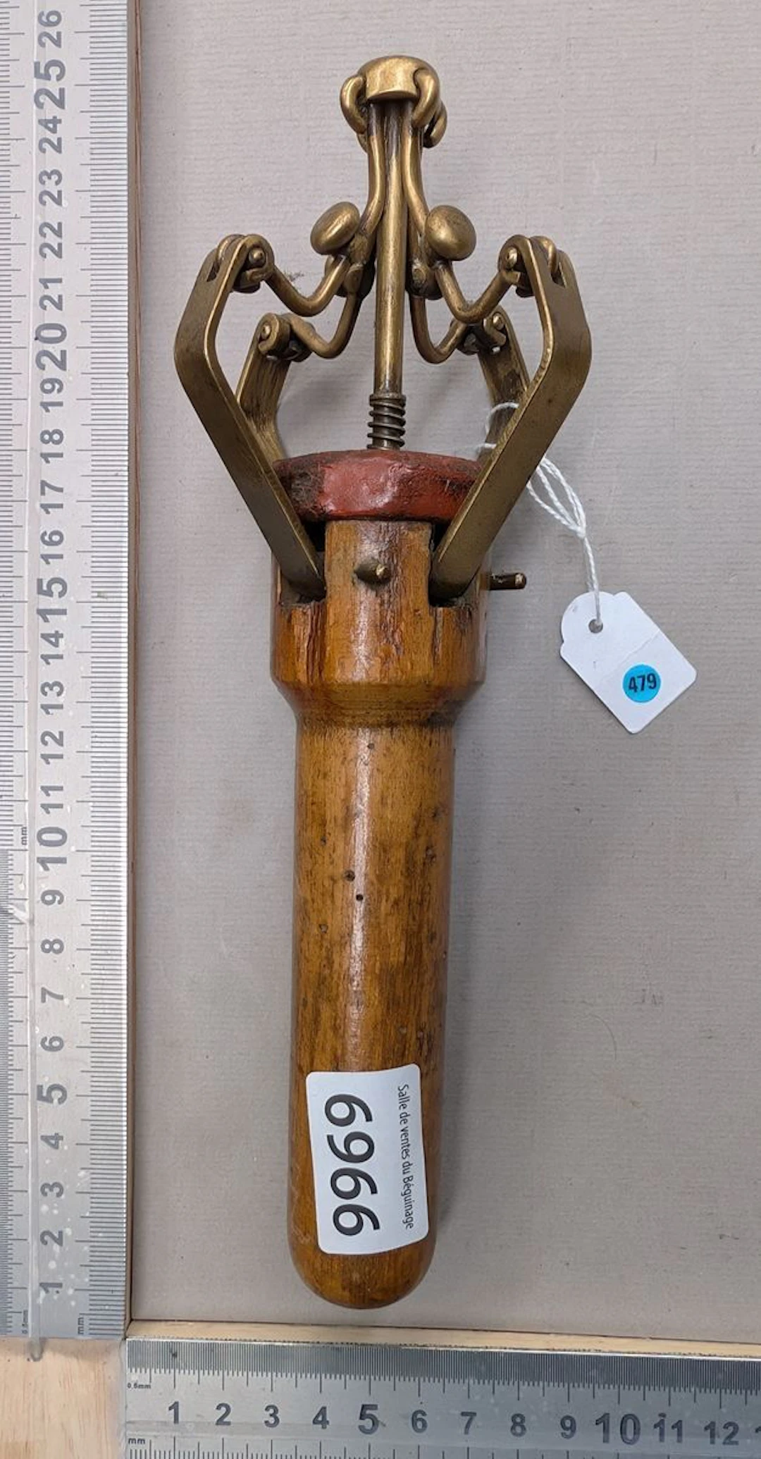 Antique corkscrew with multiple levers—see photos for dimensions and condition