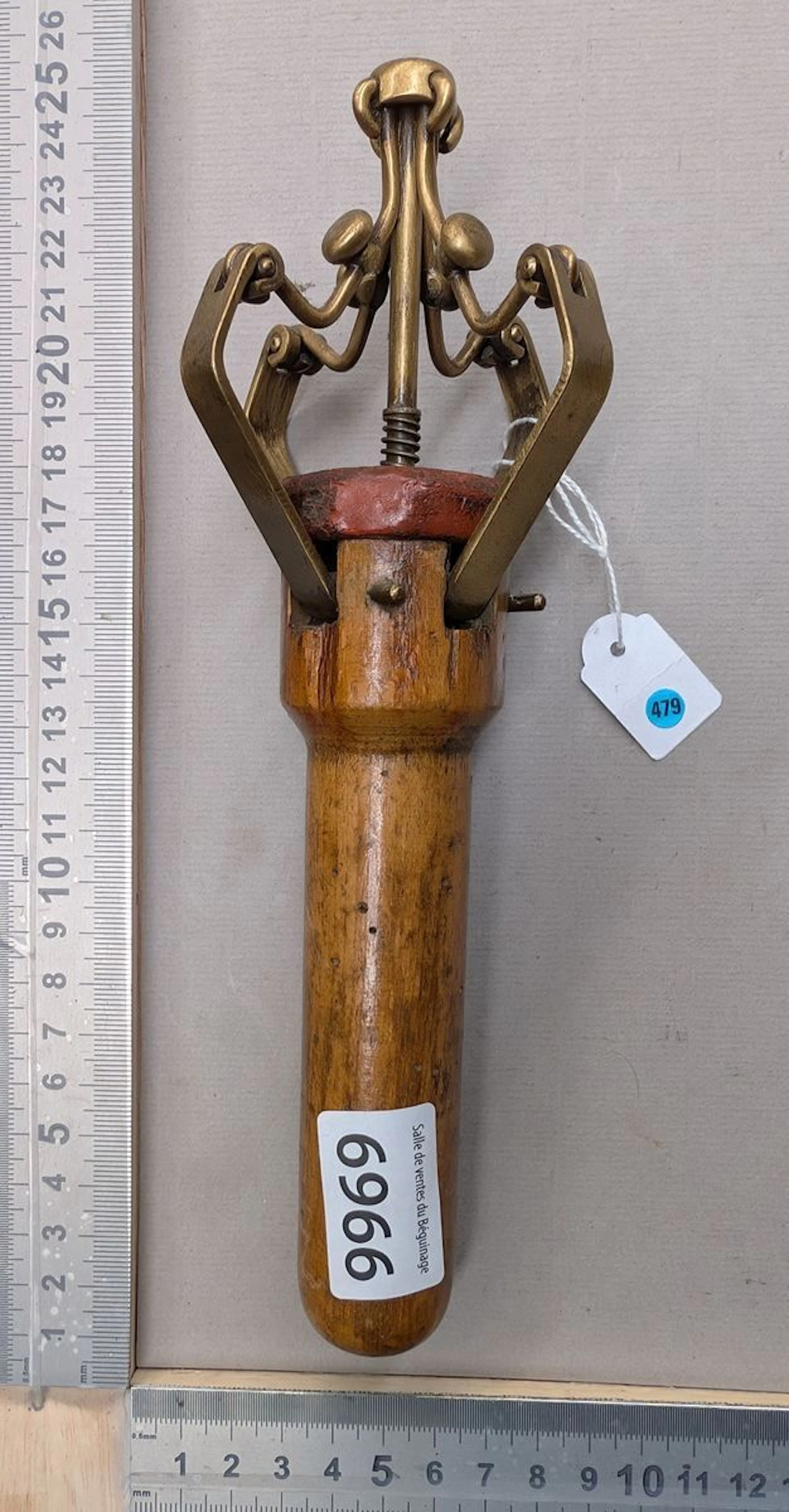 Antique corkscrew with multiple levers—see photos for dimensions and condition