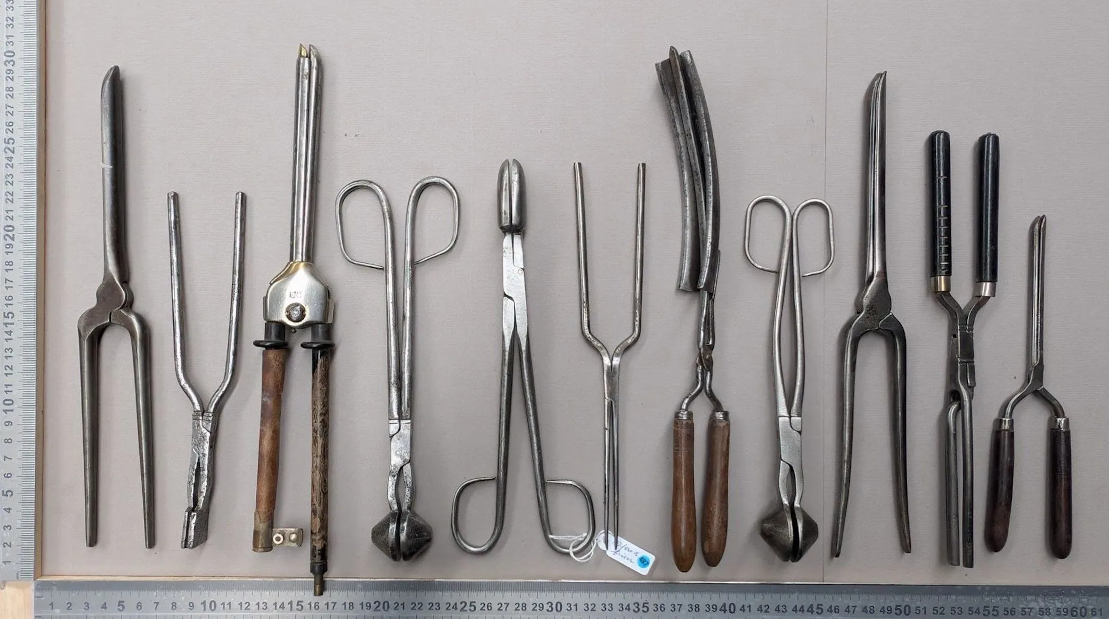 10 vintage curling irons—see photos for dimensions and condition