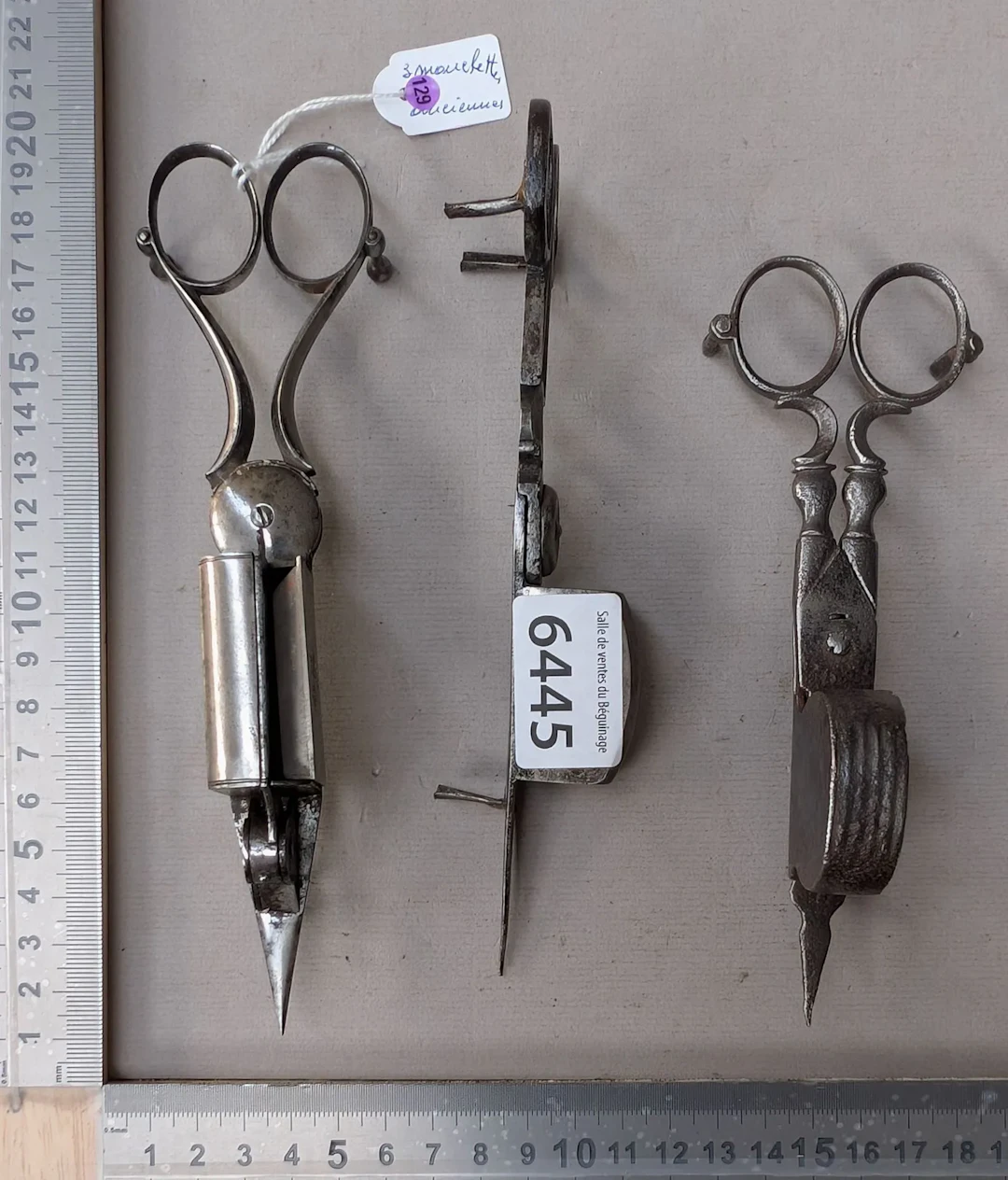 3 antique fly swatters or wrought-iron candle snuffers—see photos