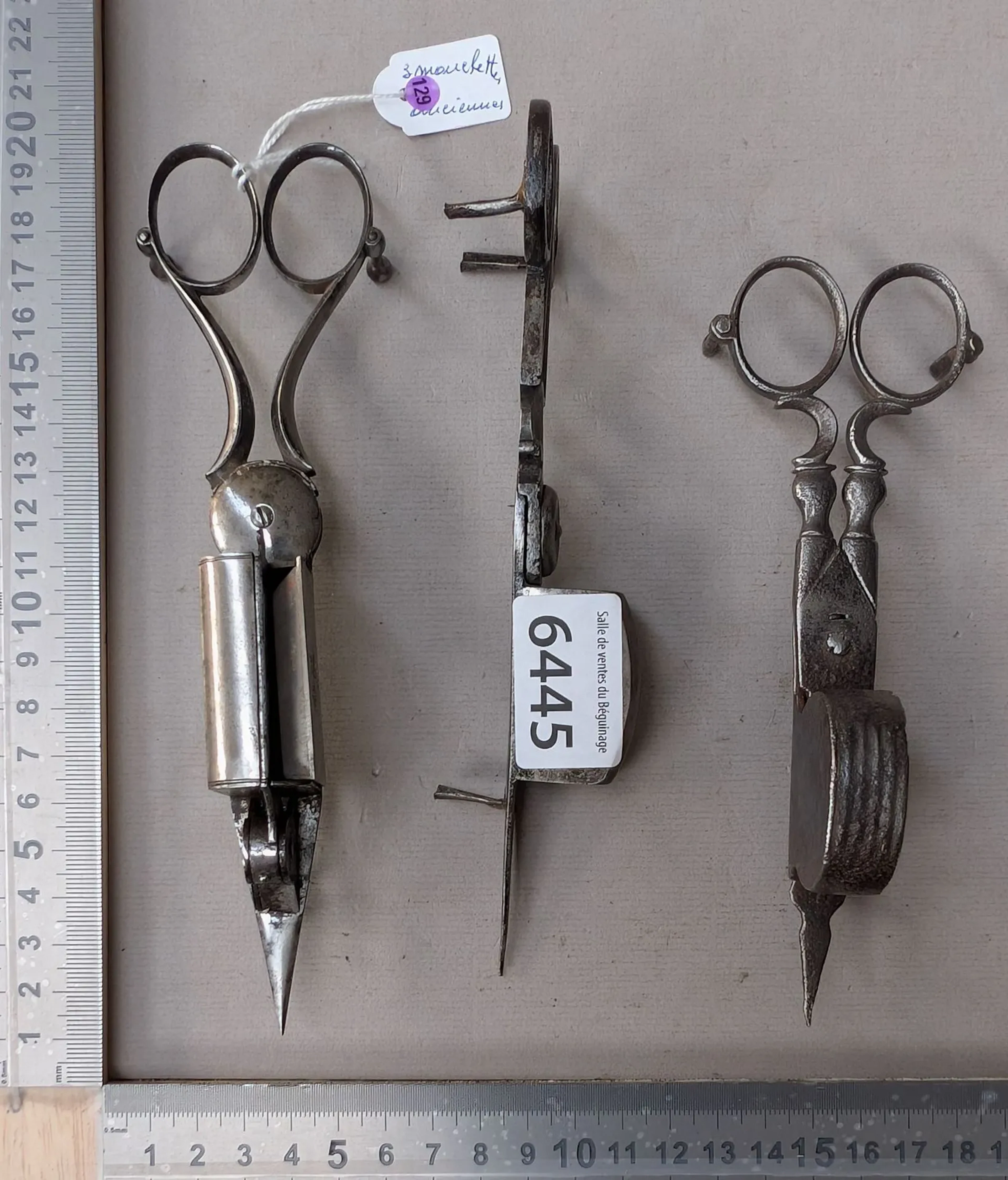 3 antique fly swatters or wrought-iron candle snuffers—see photos