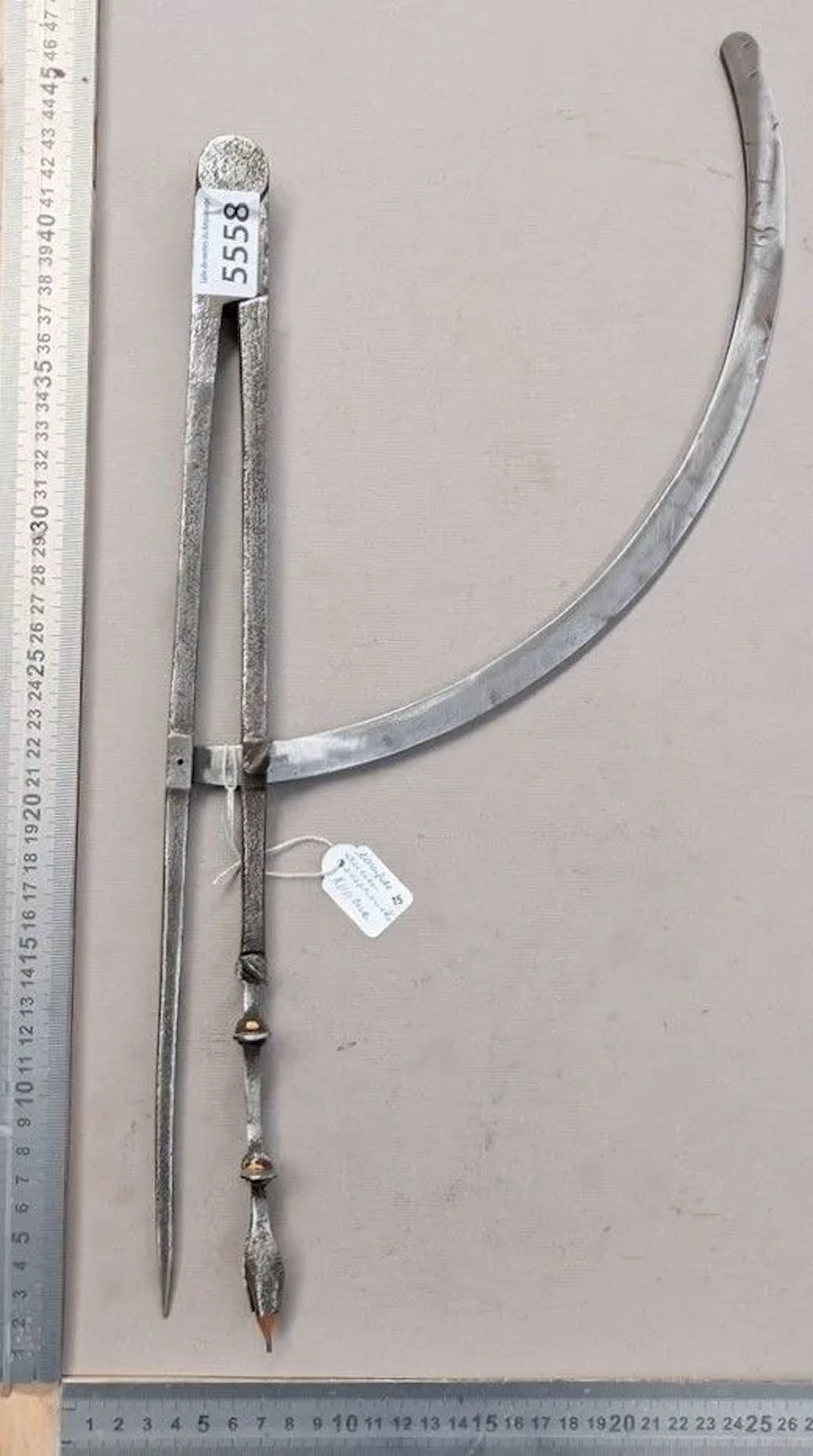 An antique 17th-century compass, in very good condition—see photos