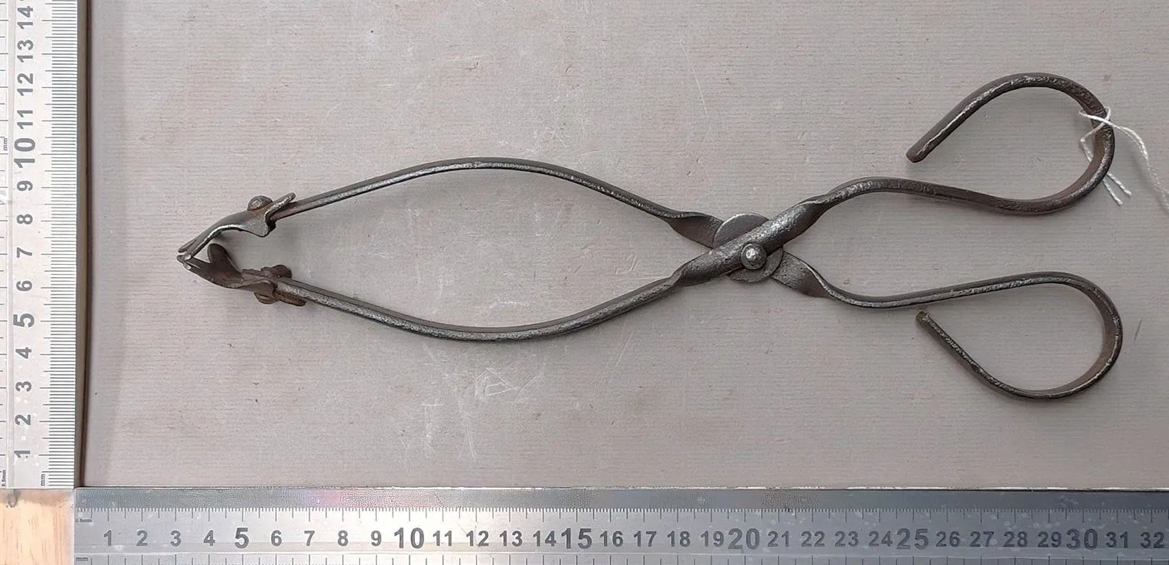 1 pair of 18th-century wrought-iron fire tongs—see photos for dimensions