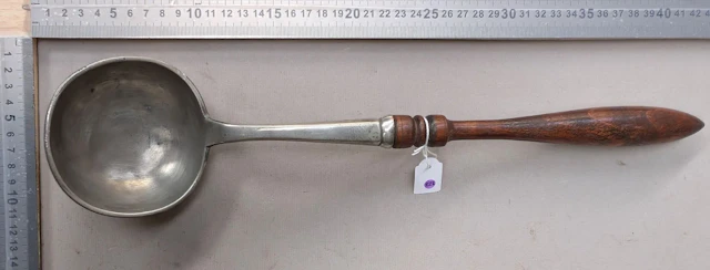 Beautiful pewter ladle with a turned wooden handle—see photos for