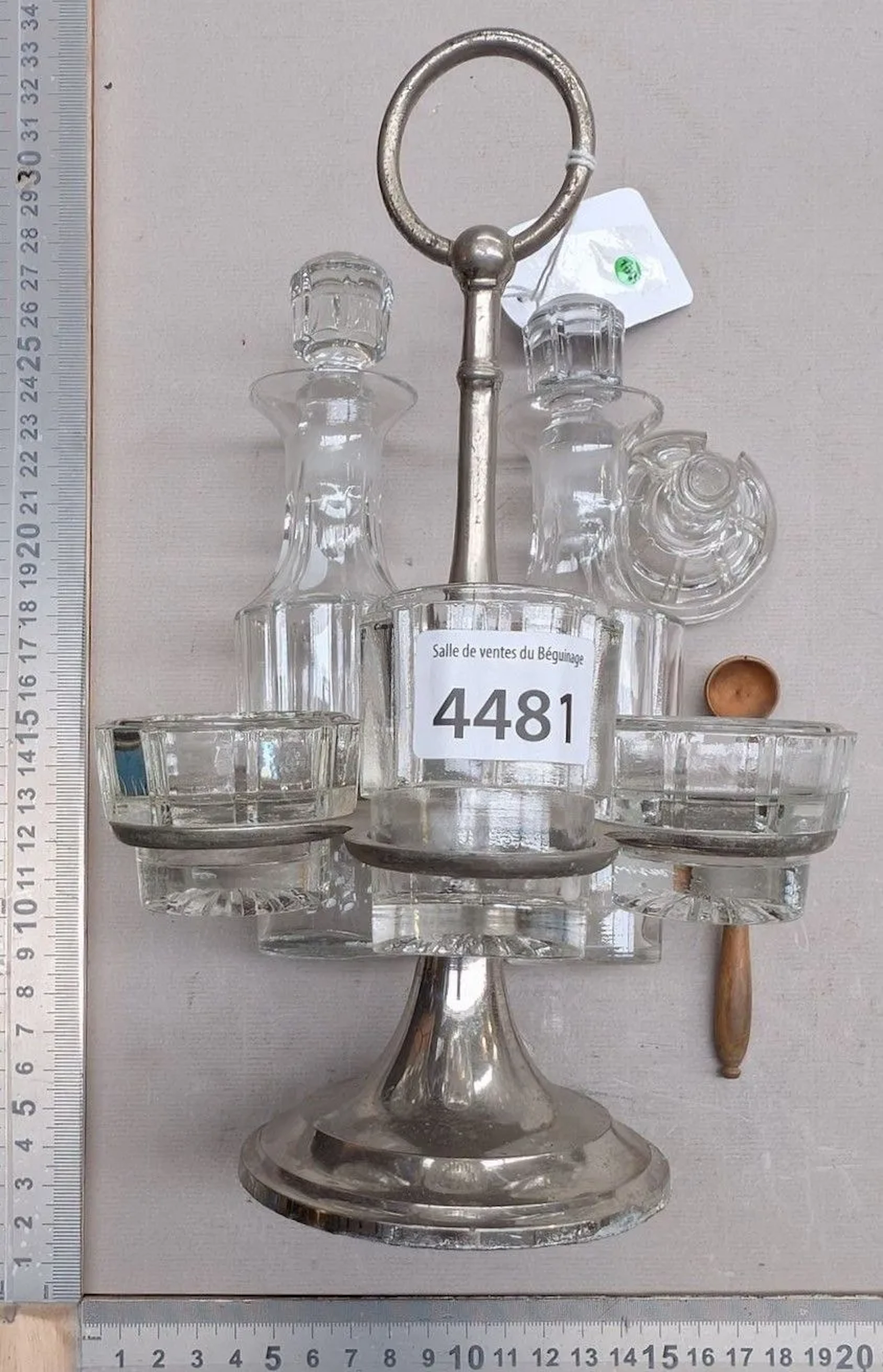 Table set for oil, vinegar, salt, pepper, and mustard—see photos for