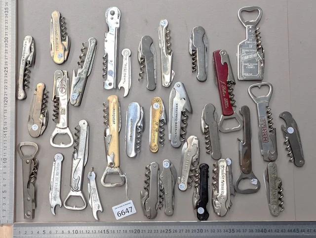 31 different bottle openers—see photos for dimensions and condition