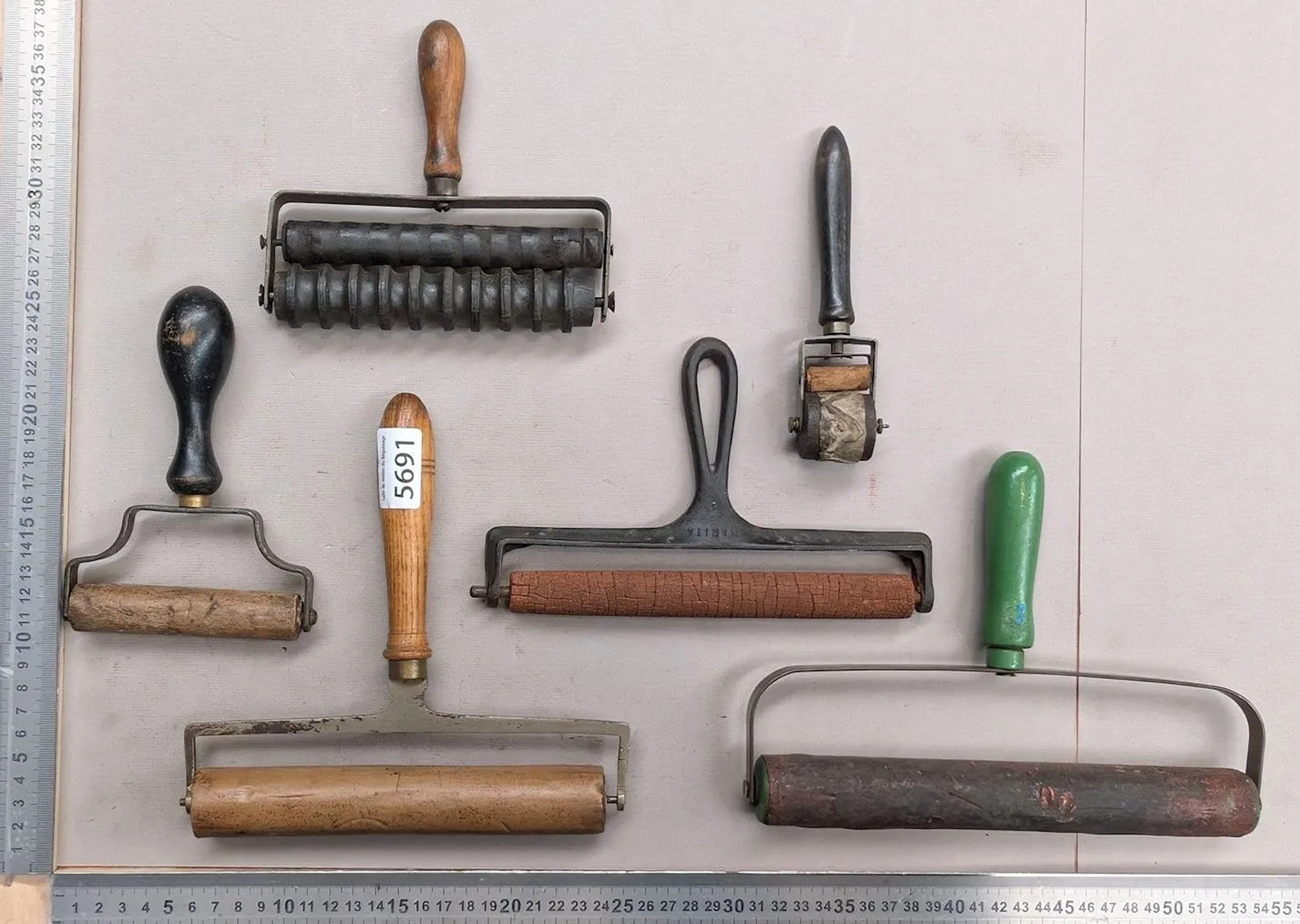 6 antique printing rollers and tools—see photos for dimensions and condition