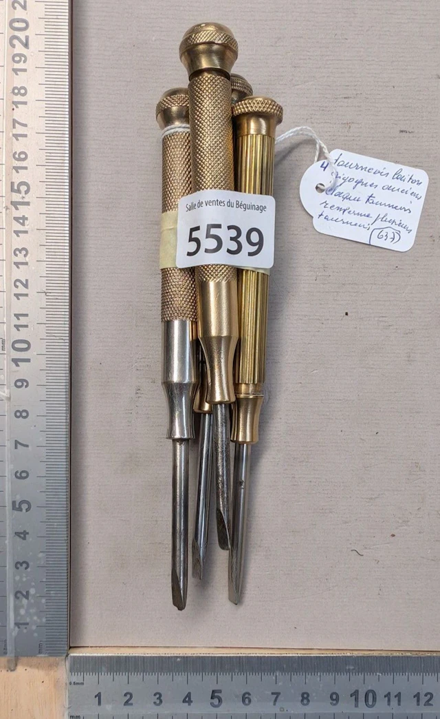 4 antique nesting screwdrivers; each screwdriver contains several