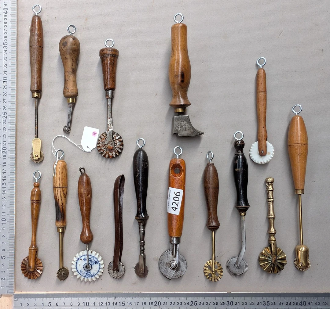 15 shoemaker's and saddler's tools on an oak base—see photos for dimensions