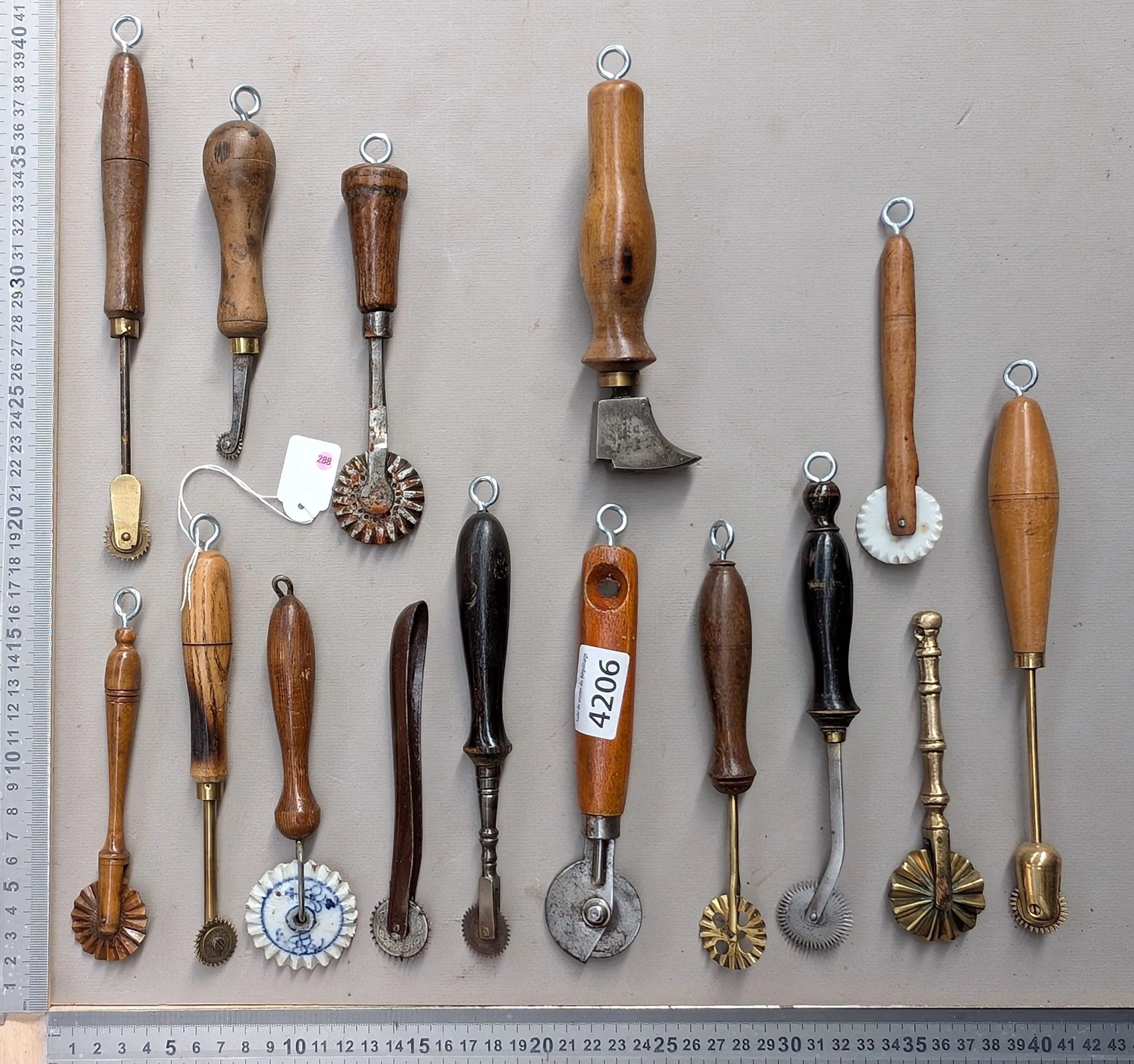 15 shoemaker's and saddler's tools on an oak base—see photos for dimensions