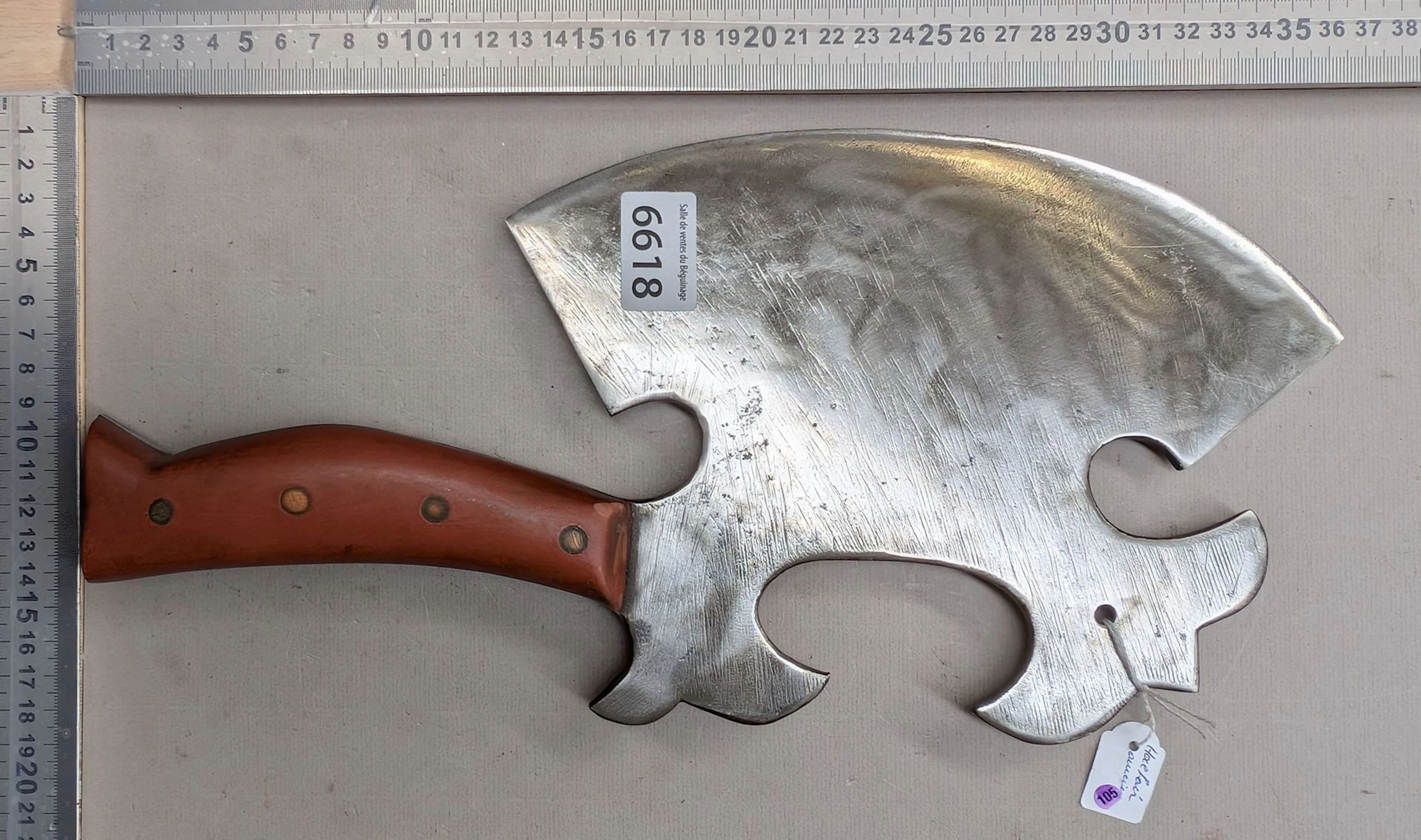 Antique cleaver with steel blade and wooden handle—see photos for