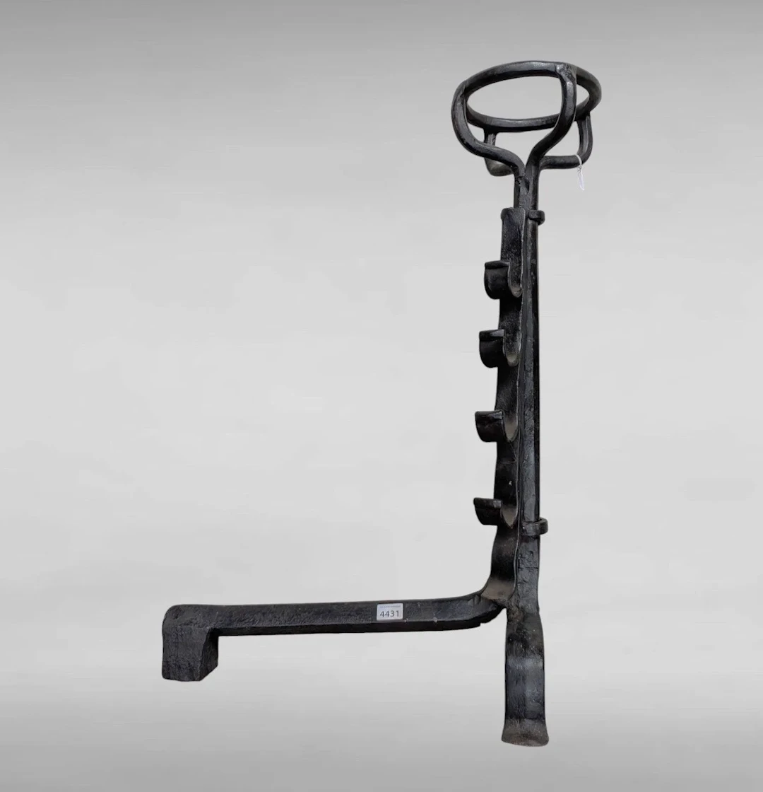 1 17th-century wrought-iron bowl-shaped coat rack with 4 hooks—see