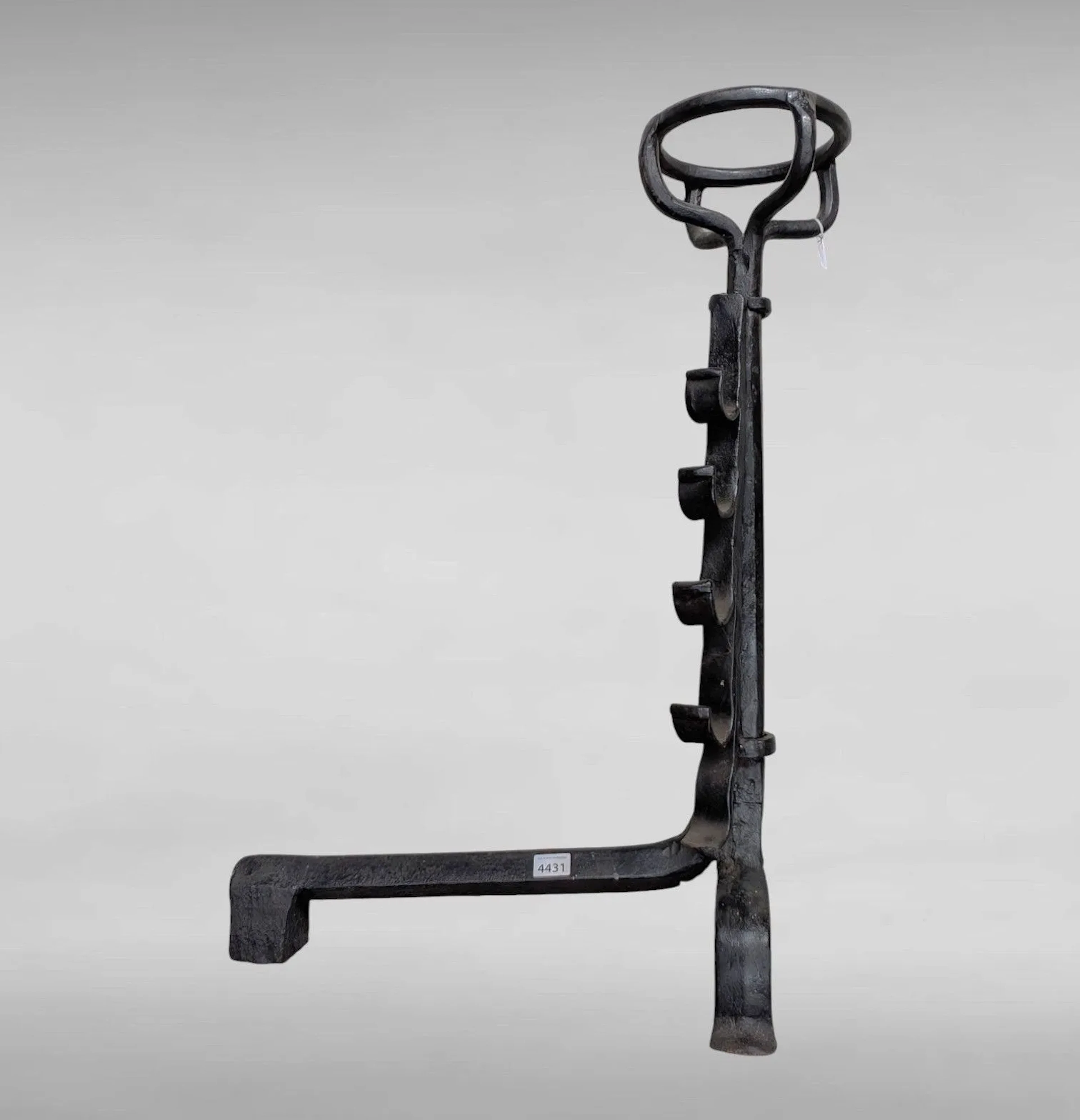 1 17th-century wrought-iron bowl-shaped coat rack with 4 hooks—see