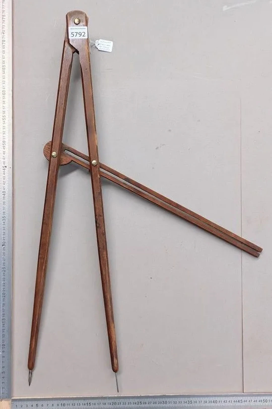An antique wooden compass, 3 butterflies, adjustment mechanism from