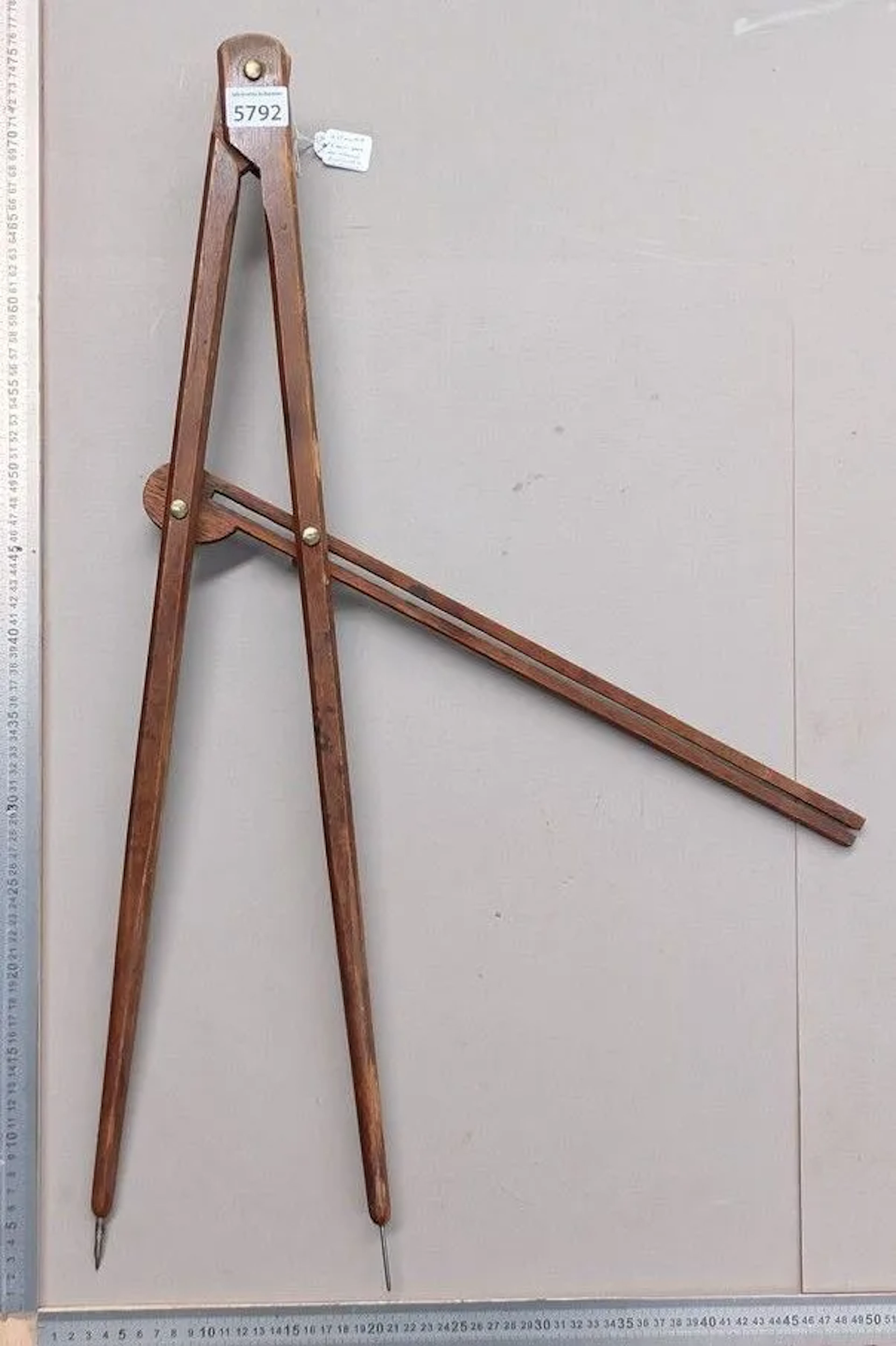 An antique wooden compass, 3 butterflies, adjustment mechanism from