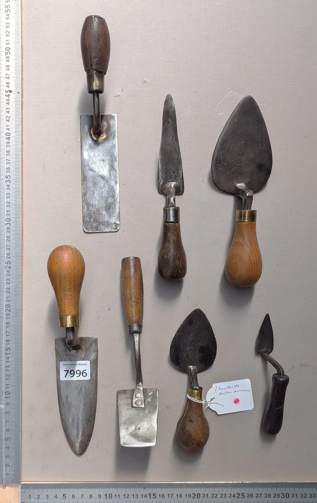 7 trowels from traditional trades—see photos for dimensions and condition