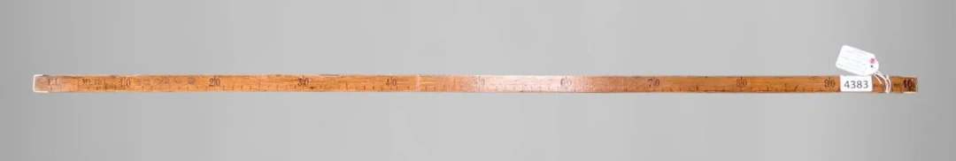 Antique wooden and brass measuring tape—see photos for dimensions and condition