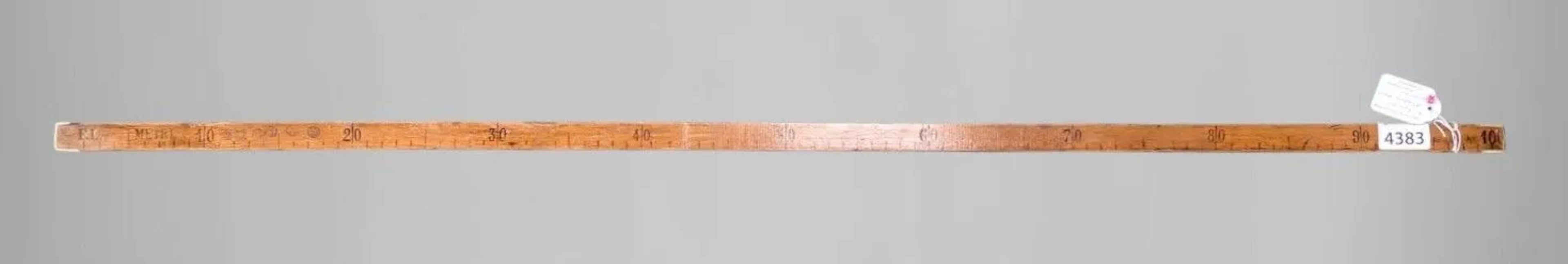 Antique wooden and brass measuring tape—see photos for dimensions and condition