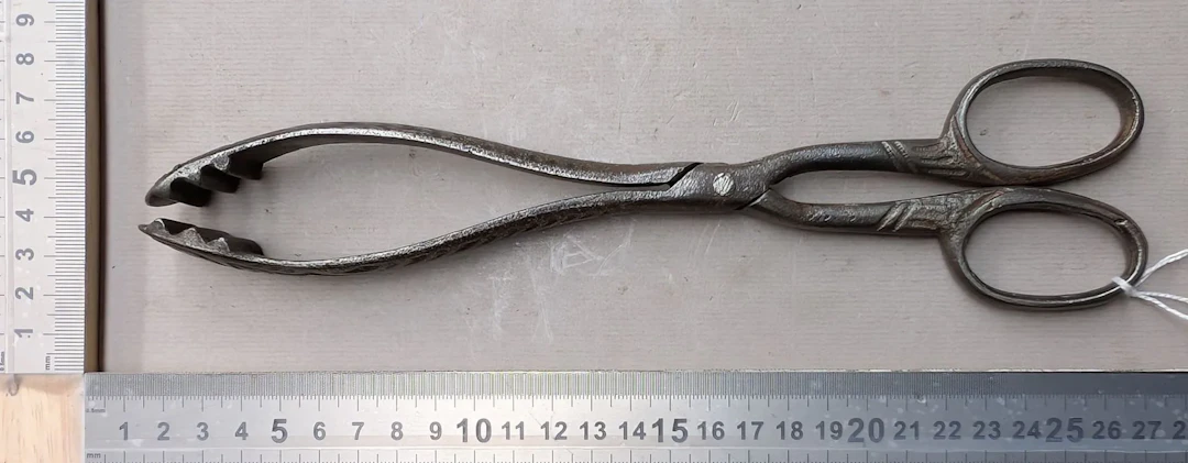 1 18th-century wrought-iron fire tongs—see photos for dimensions and condition