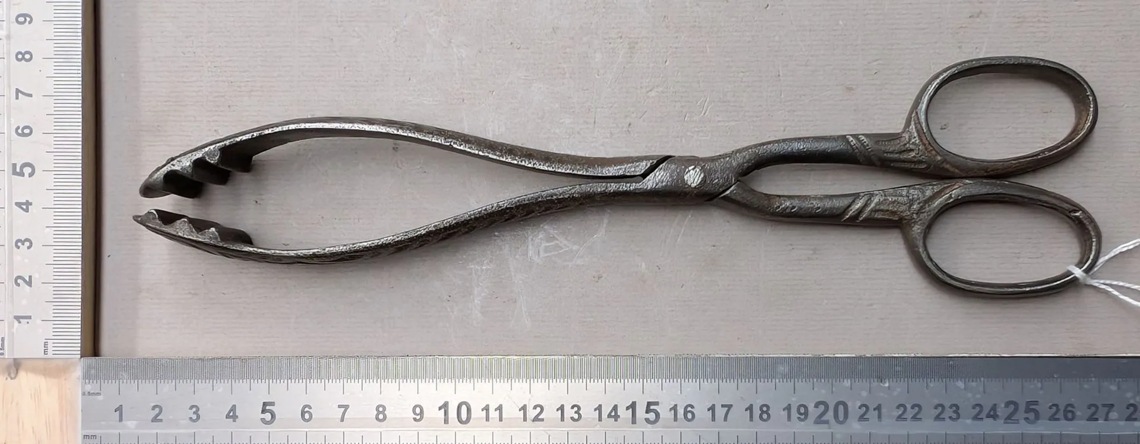 1 18th-century wrought-iron fire tongs—see photos for dimensions and condition