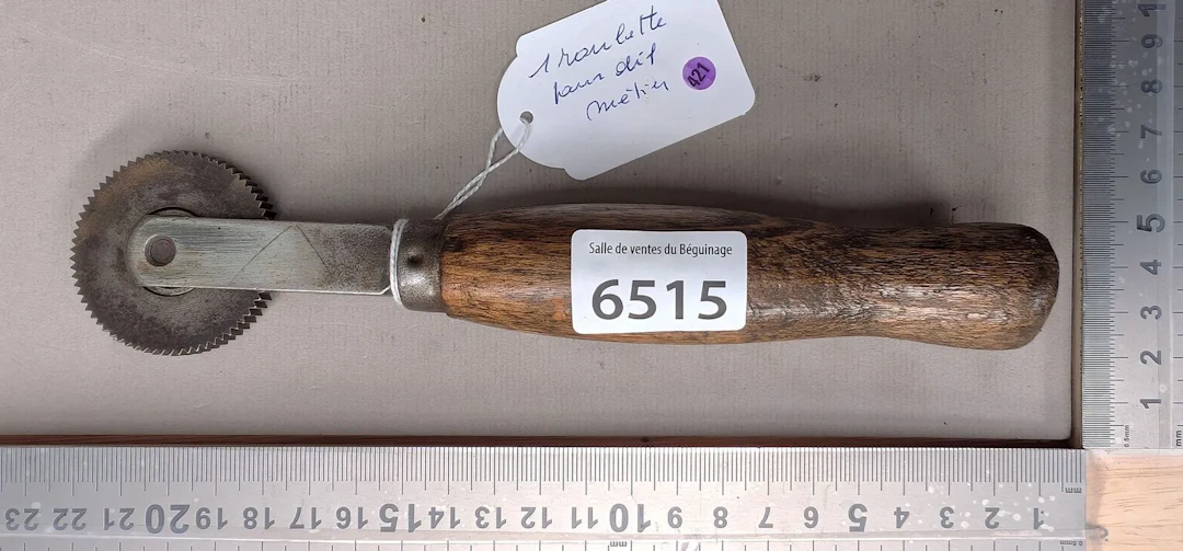 1 antique steel castor for various trades—see photos for dimensions