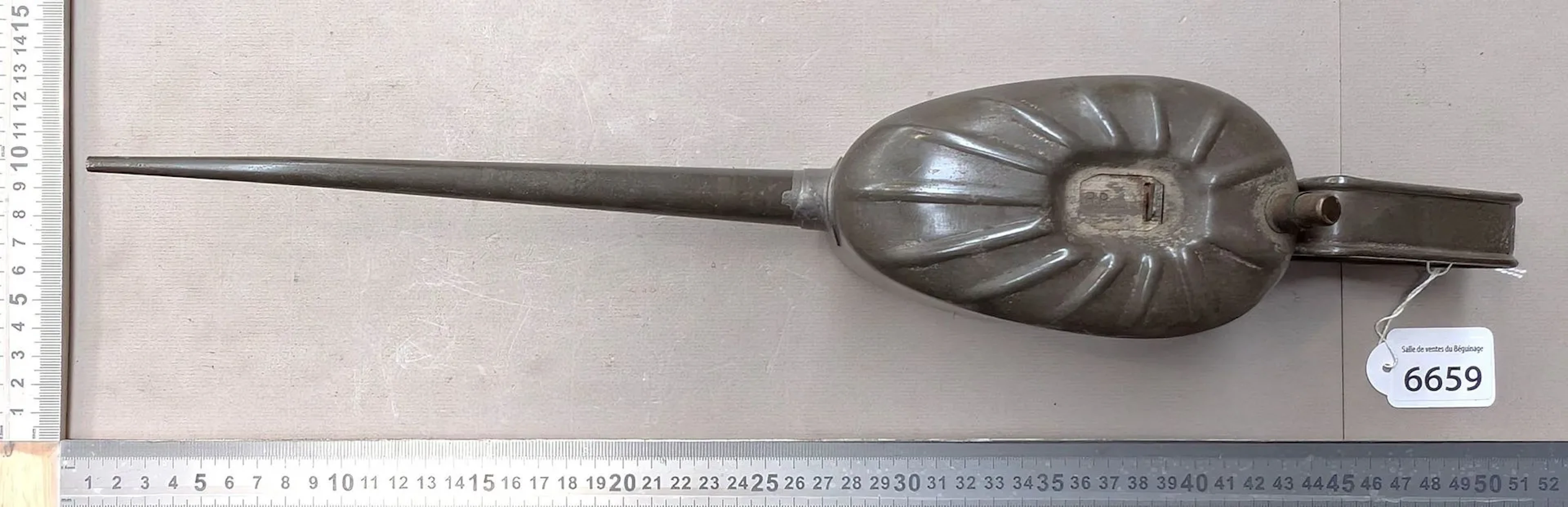 1 tin pitcher with a spout—see photos for dimensions and condition