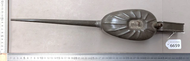 1 tin pitcher with a spout—see photos for dimensions and condition
