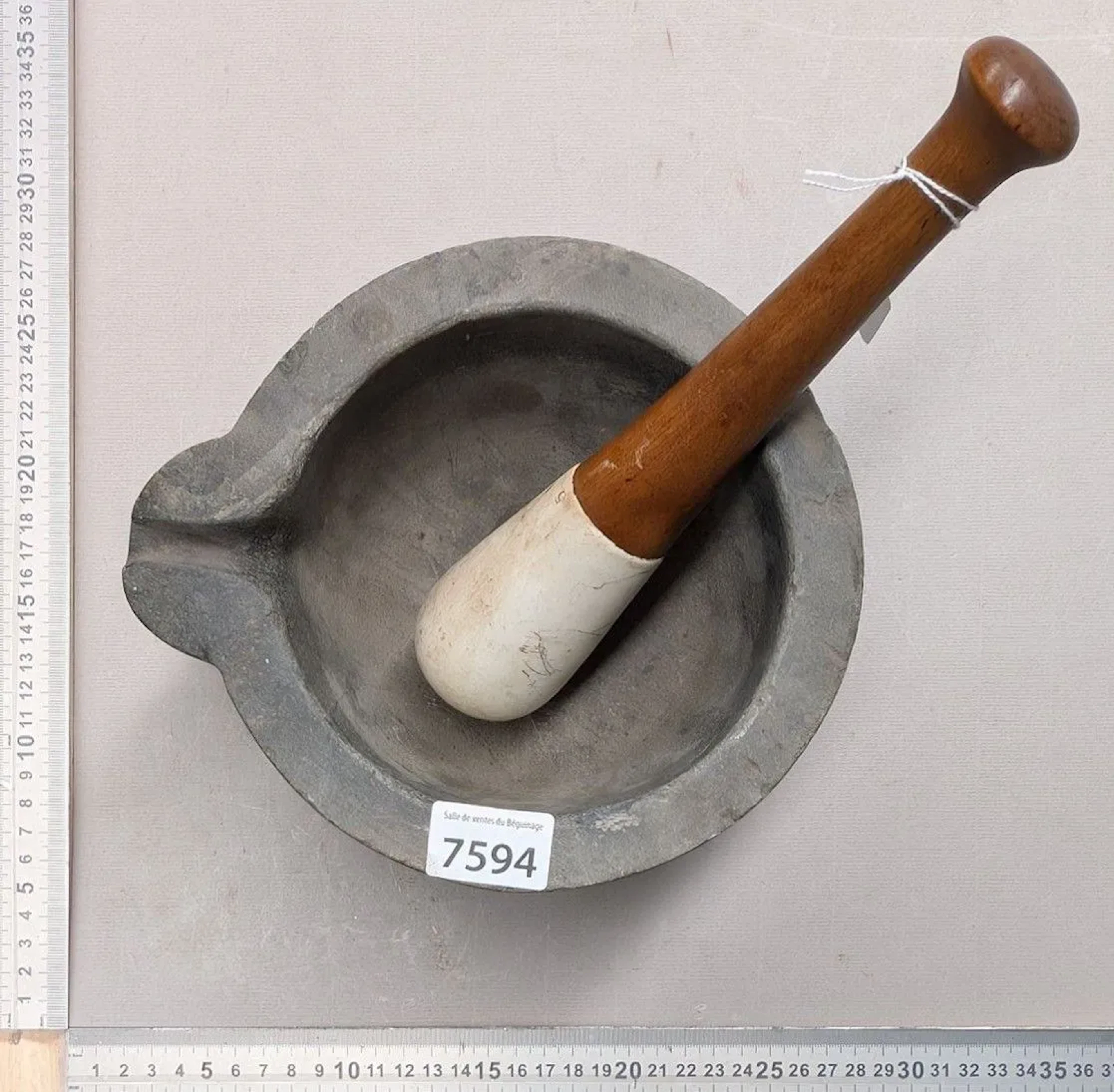 1 blue stone mortar and its pestle—see photos for dimensions and condition