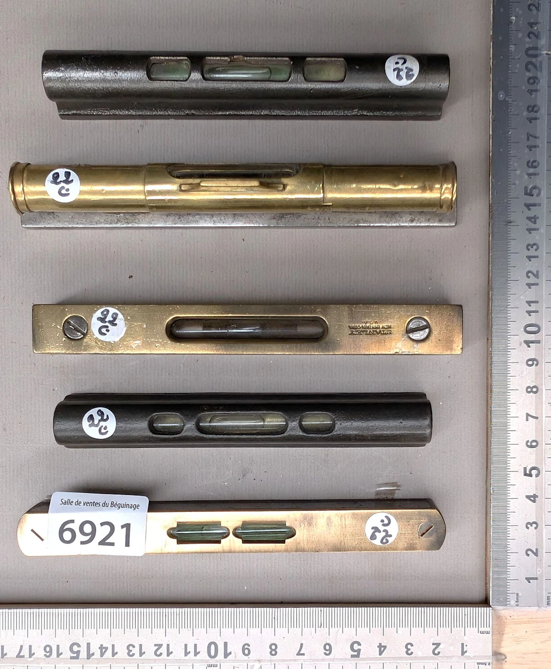 5 cast iron and brass levels—see photos for dimensions and condition