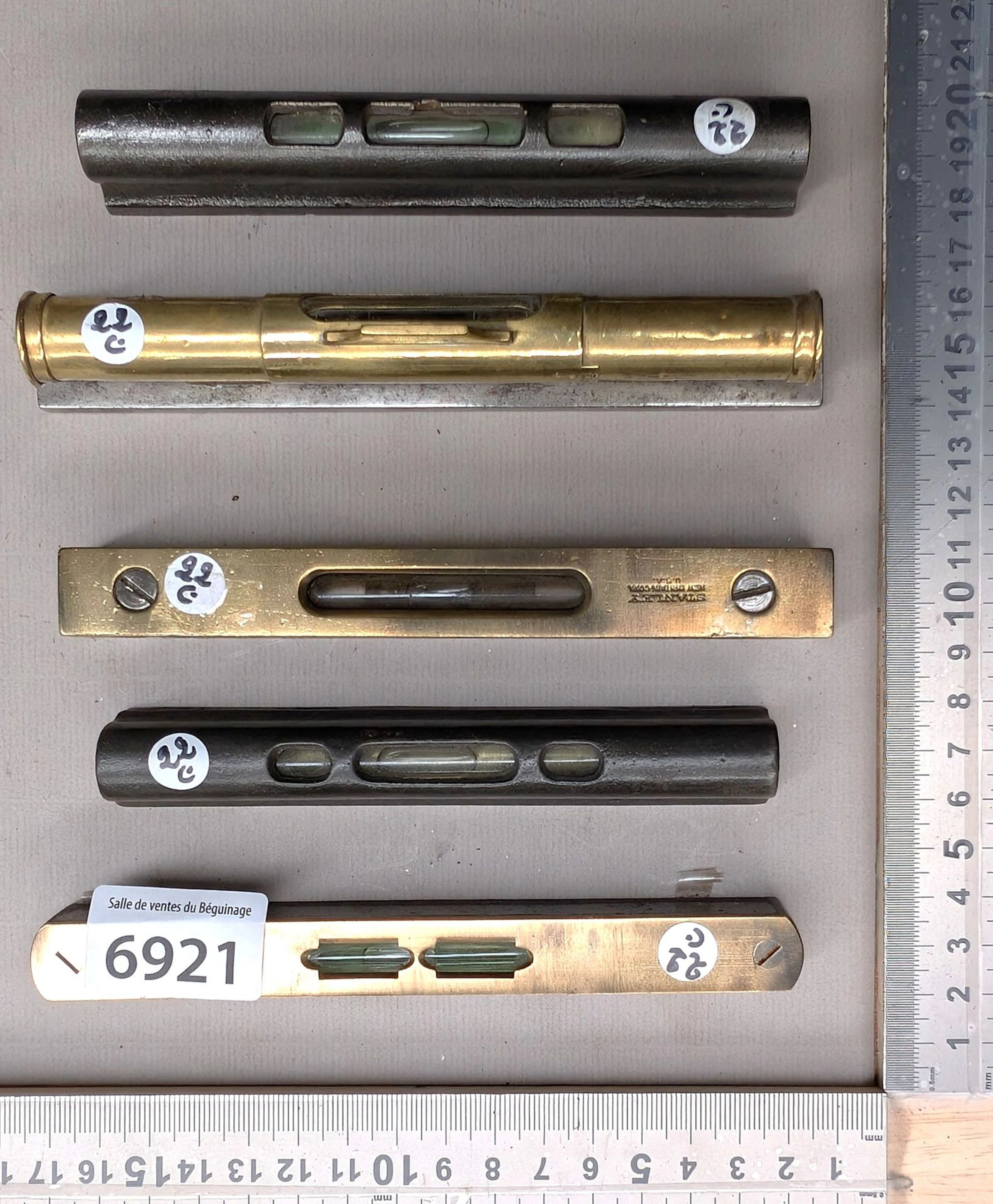 5 cast iron and brass levels—see photos for dimensions and condition