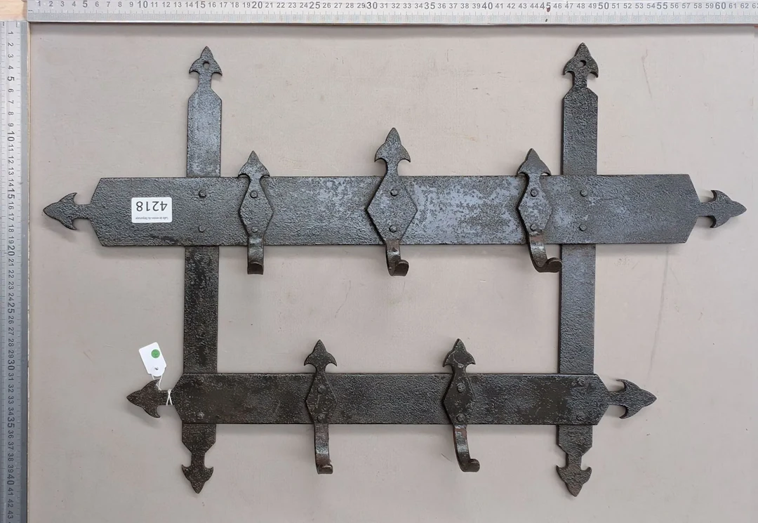 Wrought-iron bench—See photos for dimensions and condition