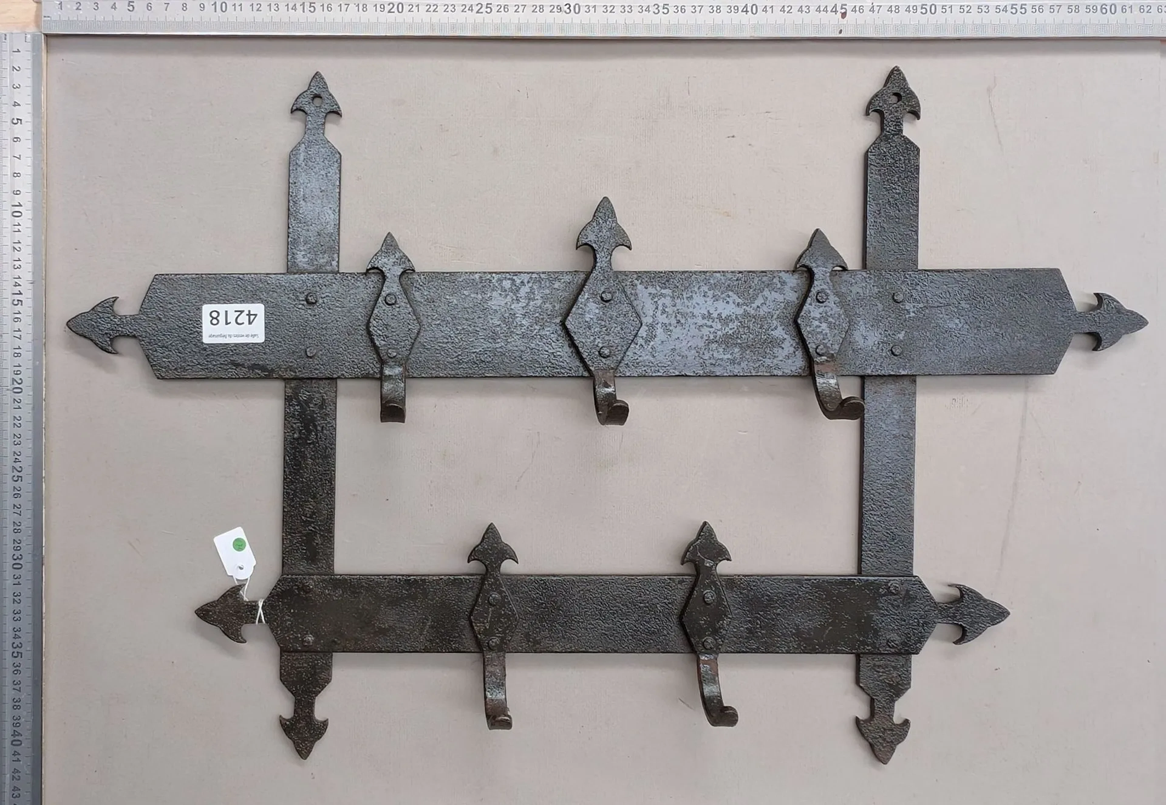 Wrought-iron bench—See photos for dimensions and condition