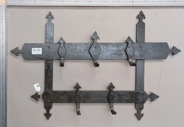 Wrought-iron bench—See photos for dimensions and condition