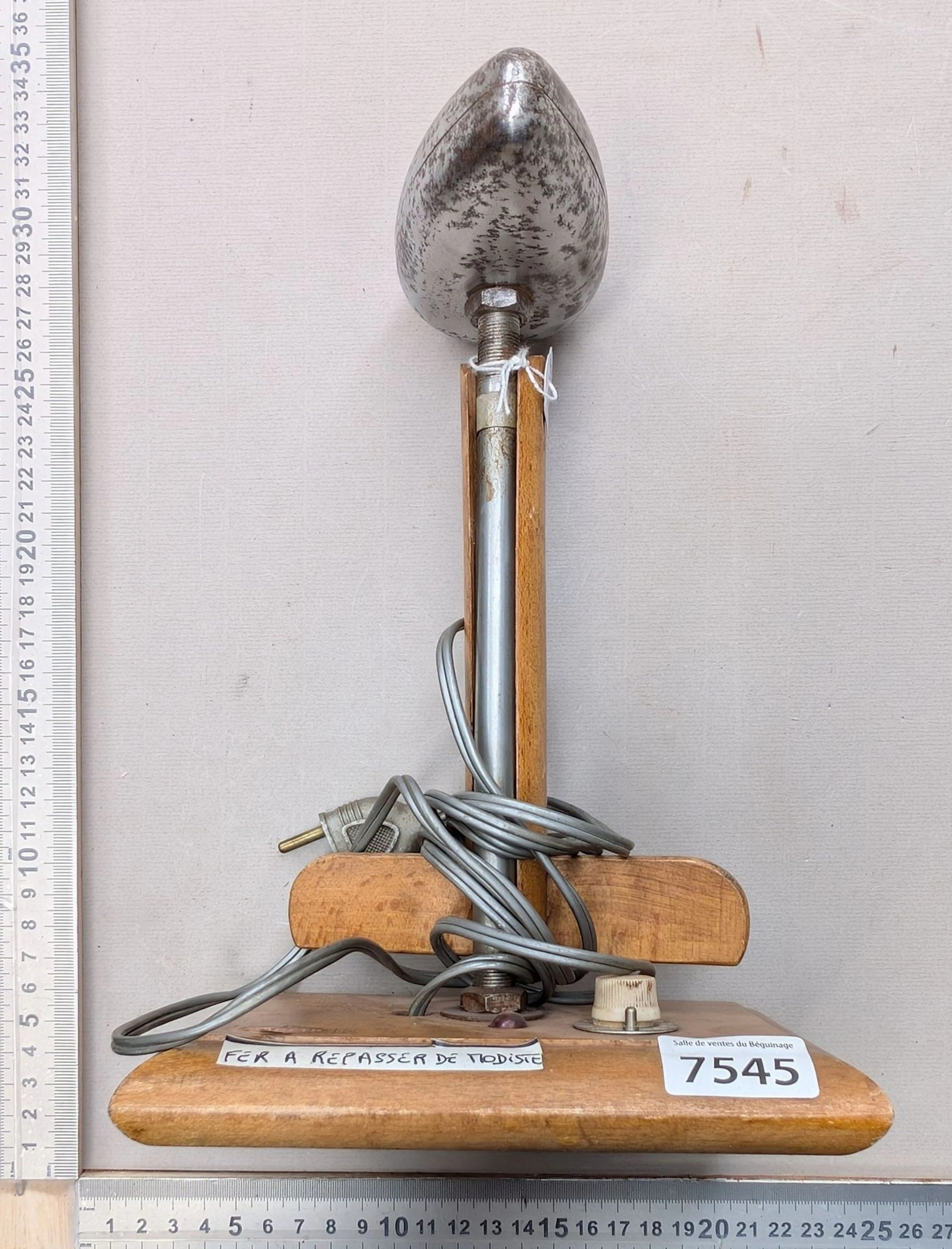 1 antique hat iron—see photos for dimensions and condition
