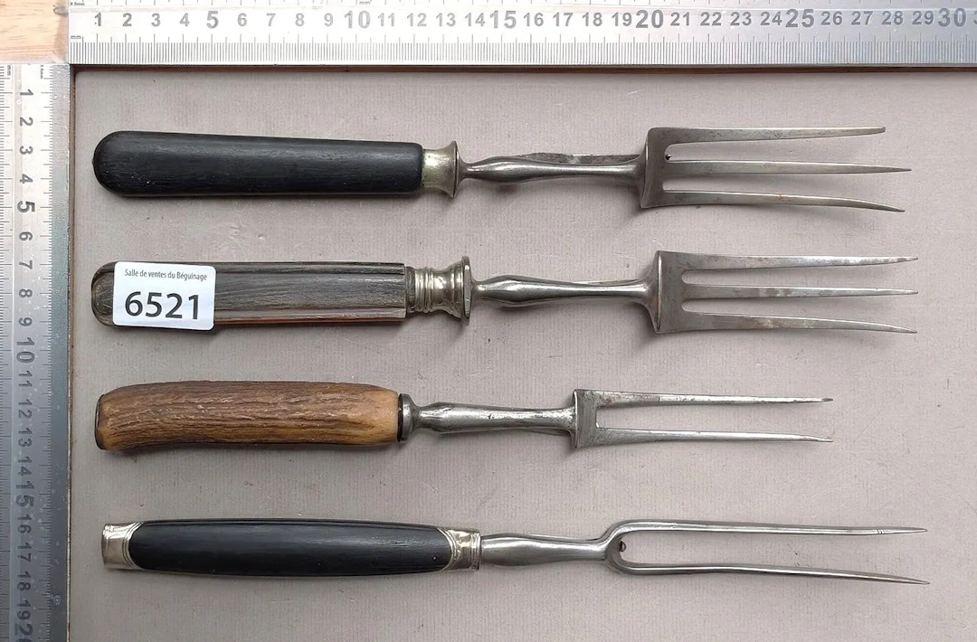 4 18th-century wrought-iron forks with 2 and 3 tines, in their original